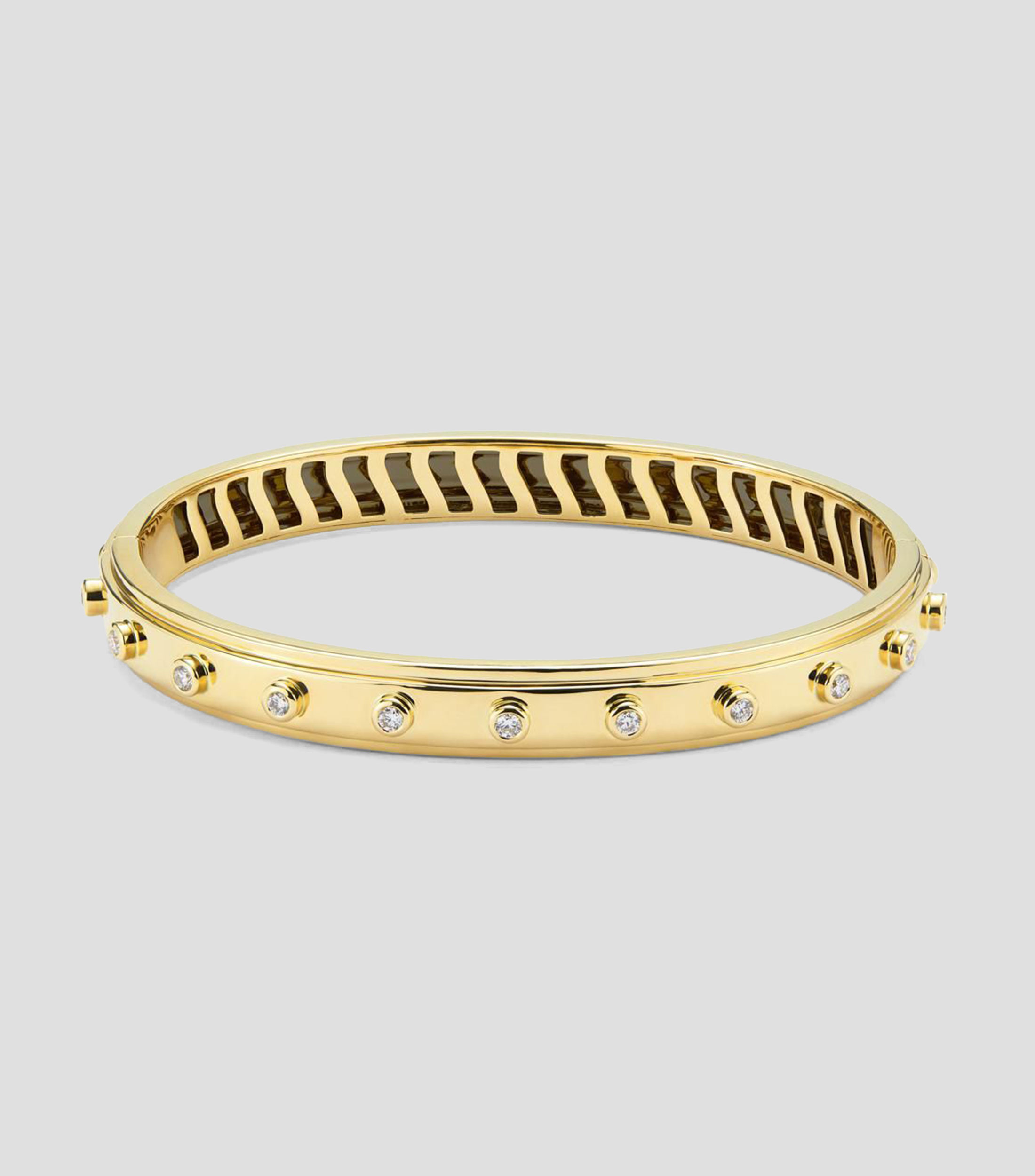 Brazalete rígido en Oro amarillo de 18 Kilates con diamantes Mujer