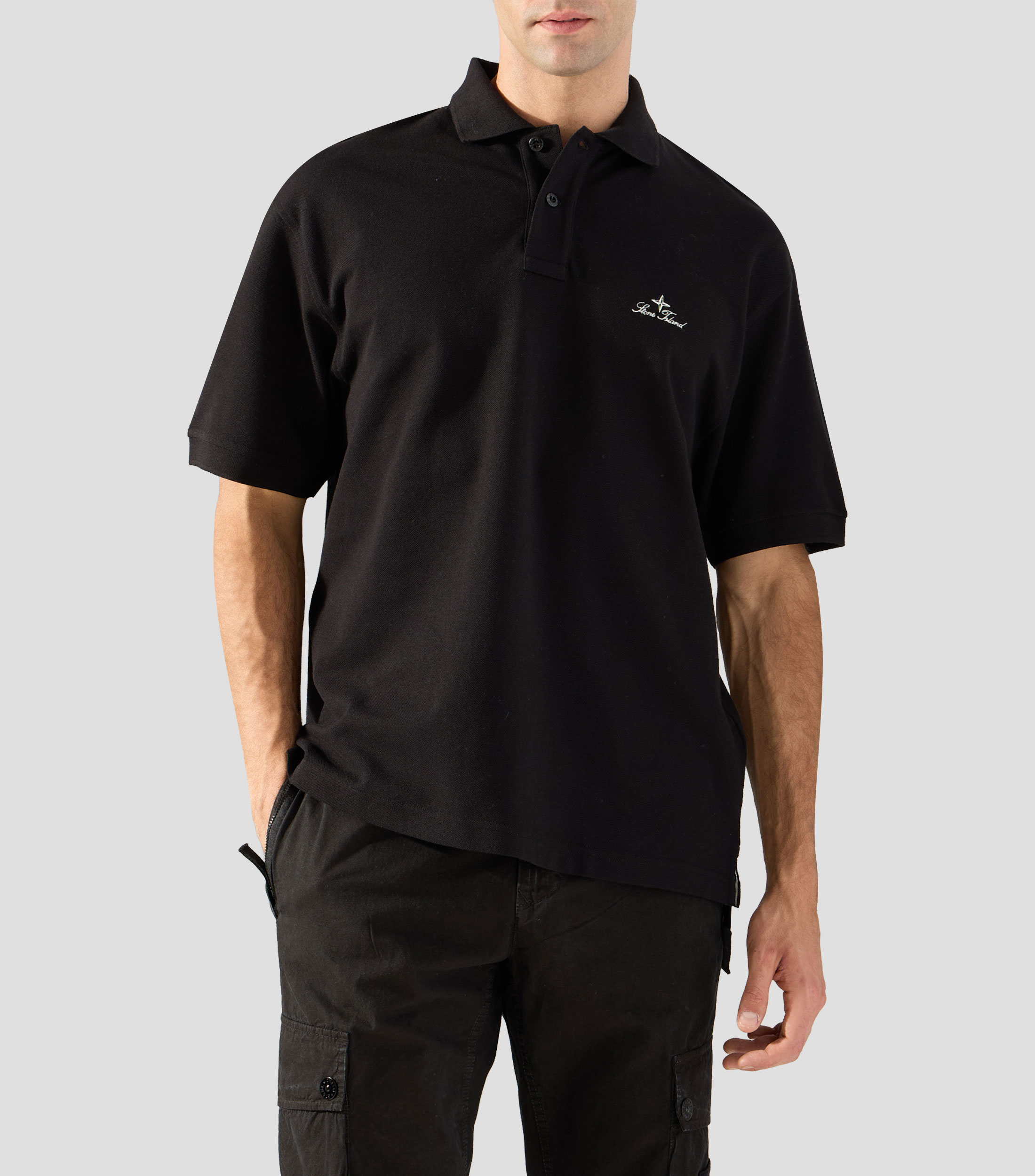 Playera tipo polo con manga corta lisa Hombre
