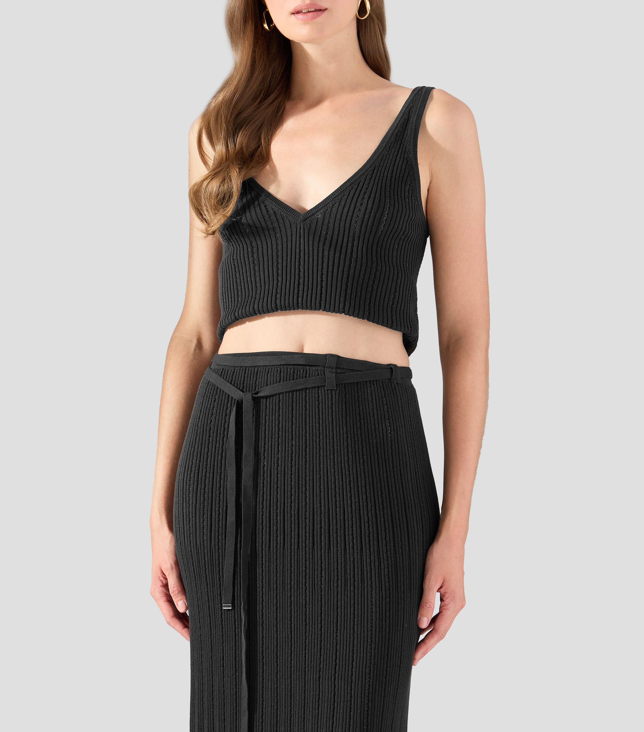 Blusa lisa sin mangas Mujer