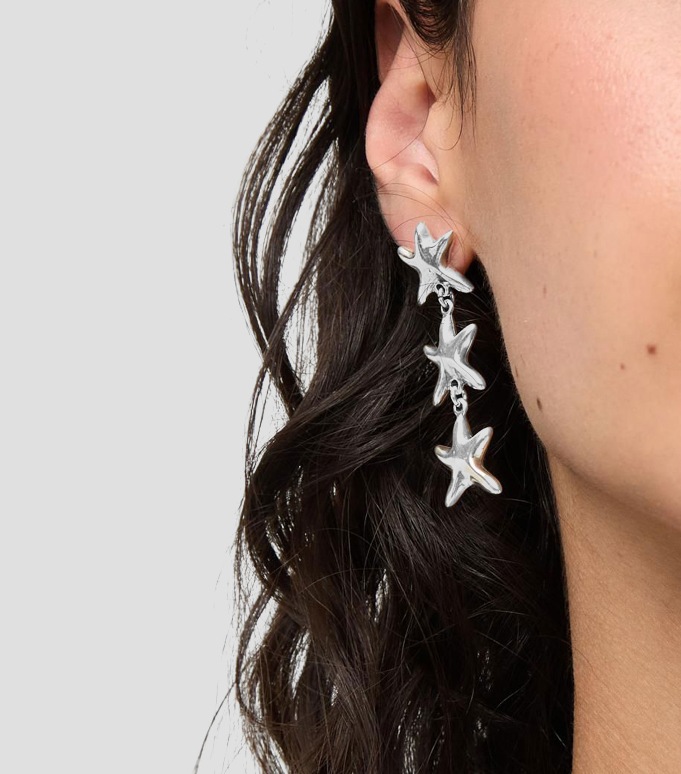 Aretes largos estrellas Arcadia Mujer