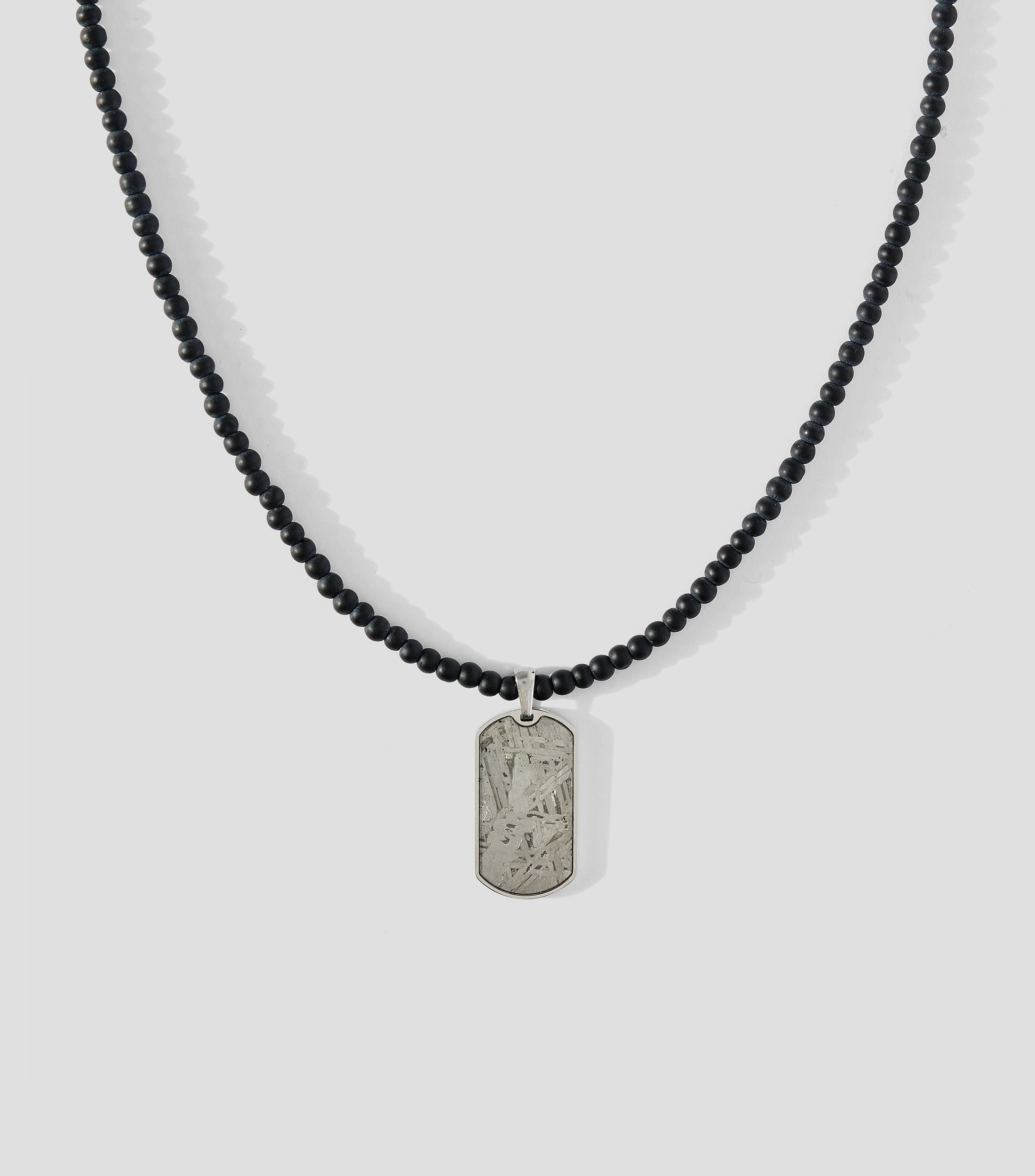 Dije placa con cadena en Meteorito Muonionalusta Hombre