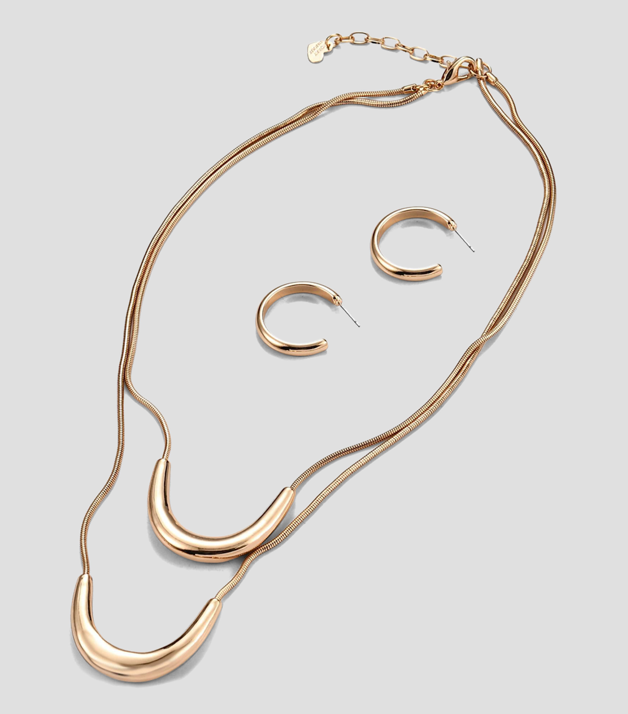 Set collar y aretes Mujer