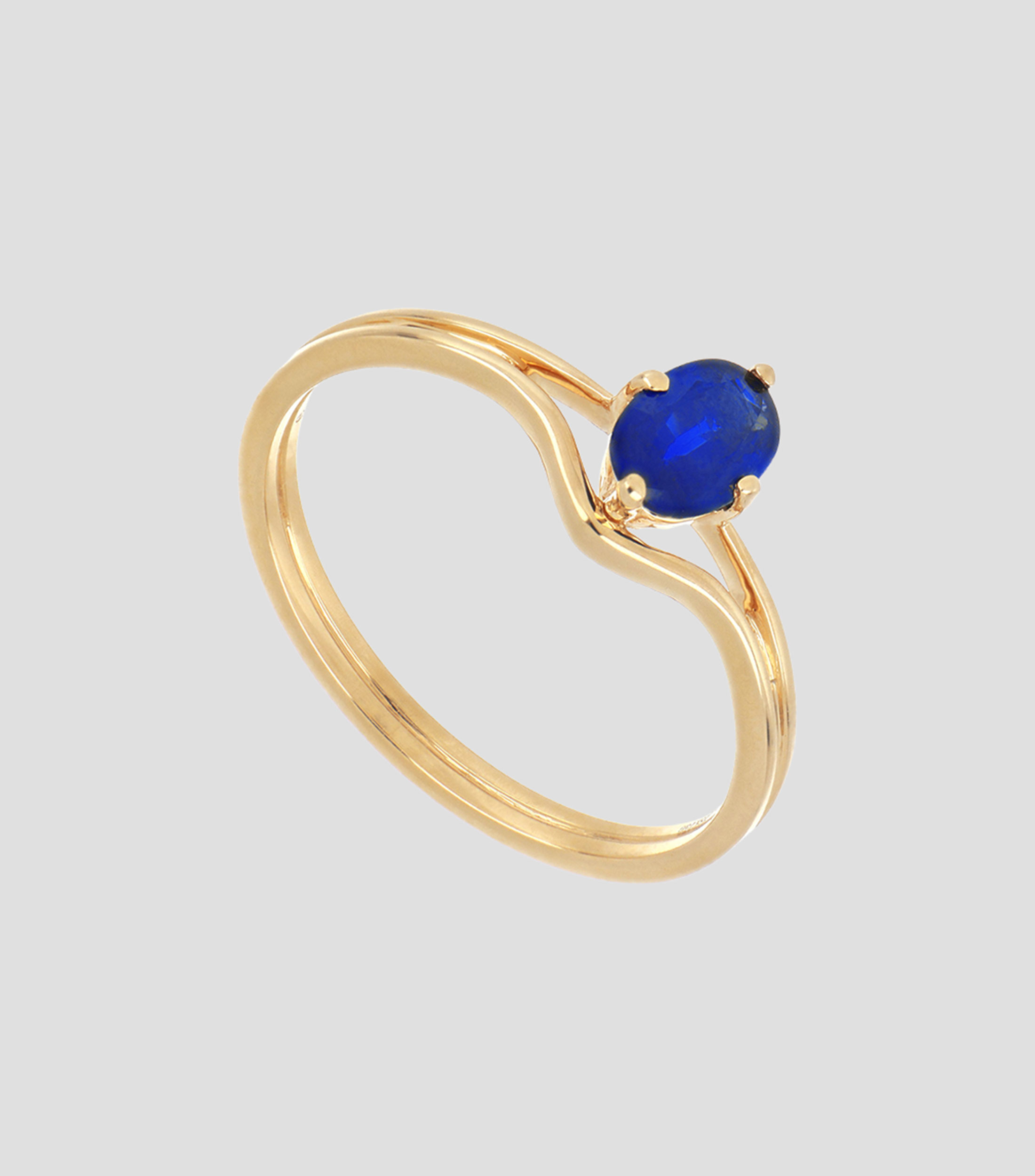 Anillo en oro amarillo de 18 kilates con incrustación de zafiro Mujer