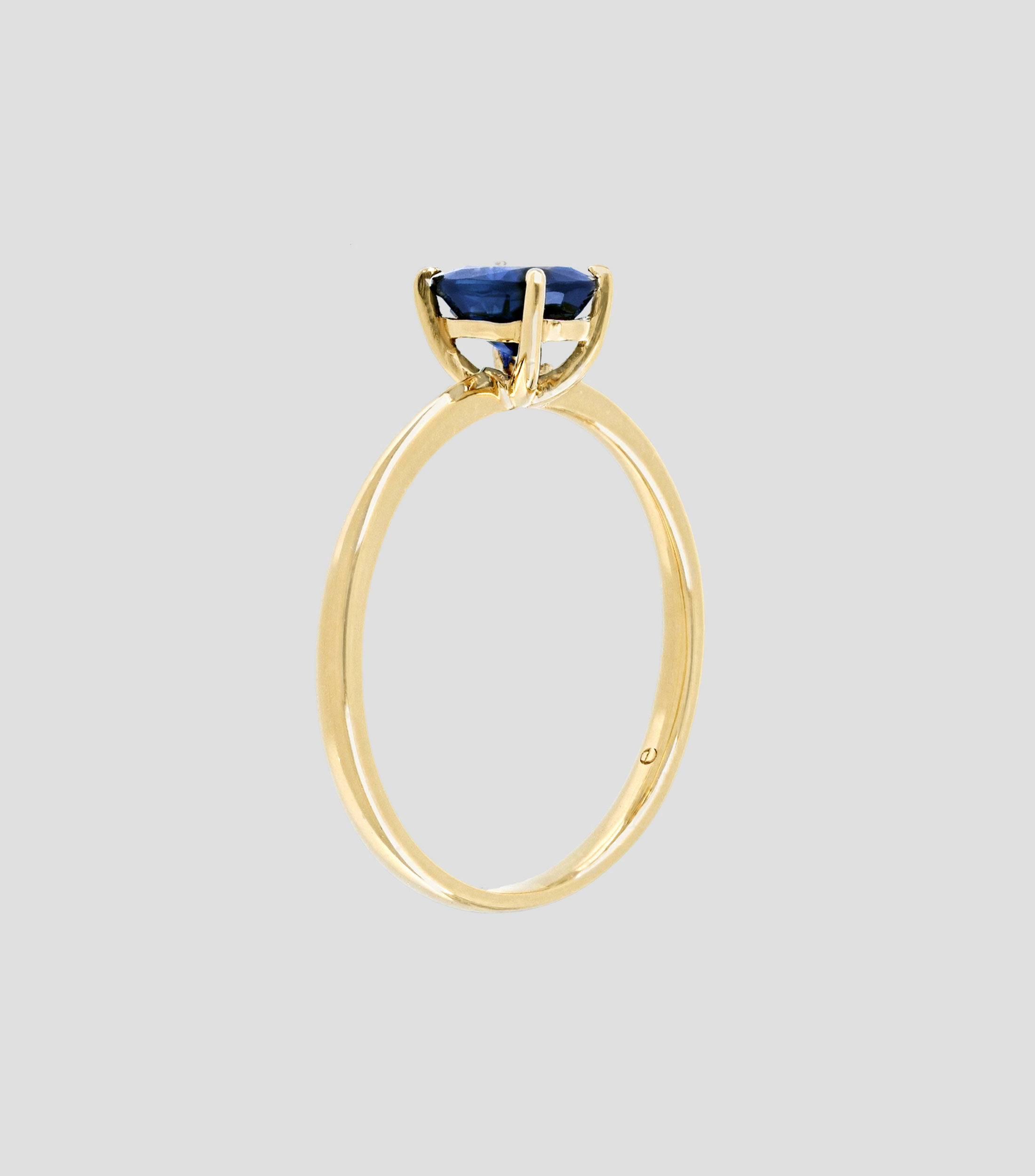 Anillo de compromiso en oro amarillo 18 Kts con zafiro Mujer
