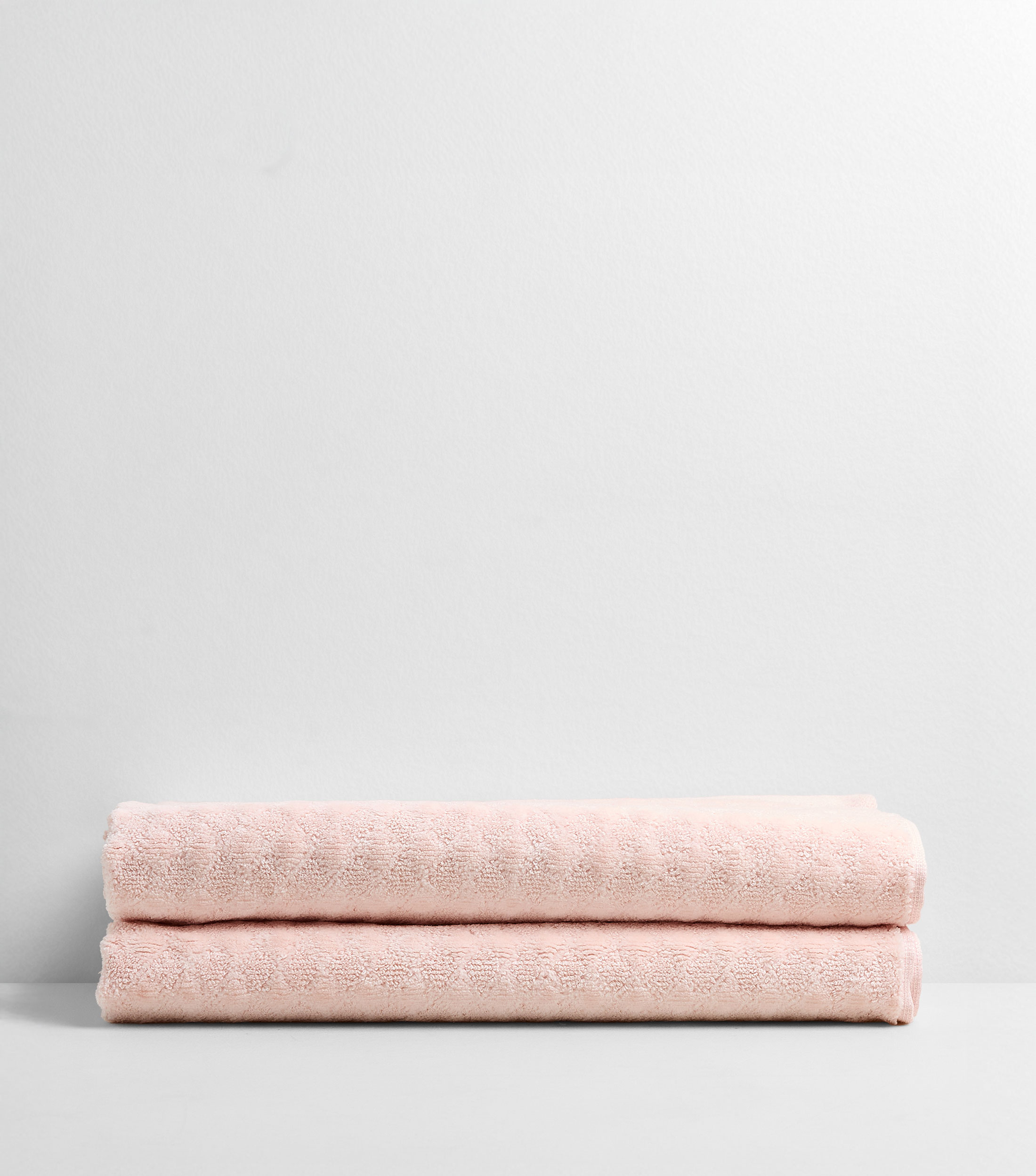 Toalla de medio baño rosa