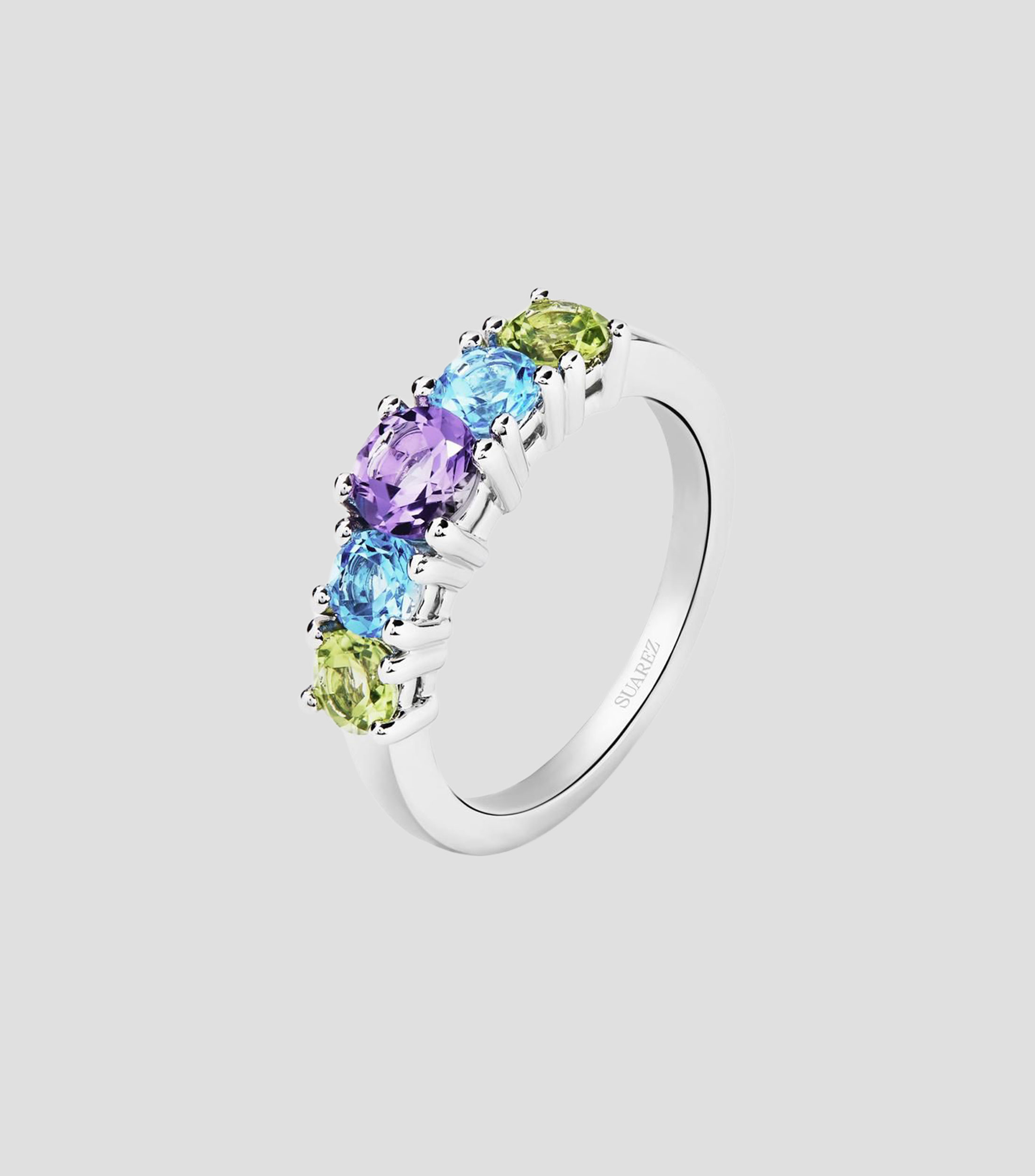 Anillo cinquillo en Plata .925 con 2 peridotos, una amatista morada, y topacios azules en talla brillante Mujer
