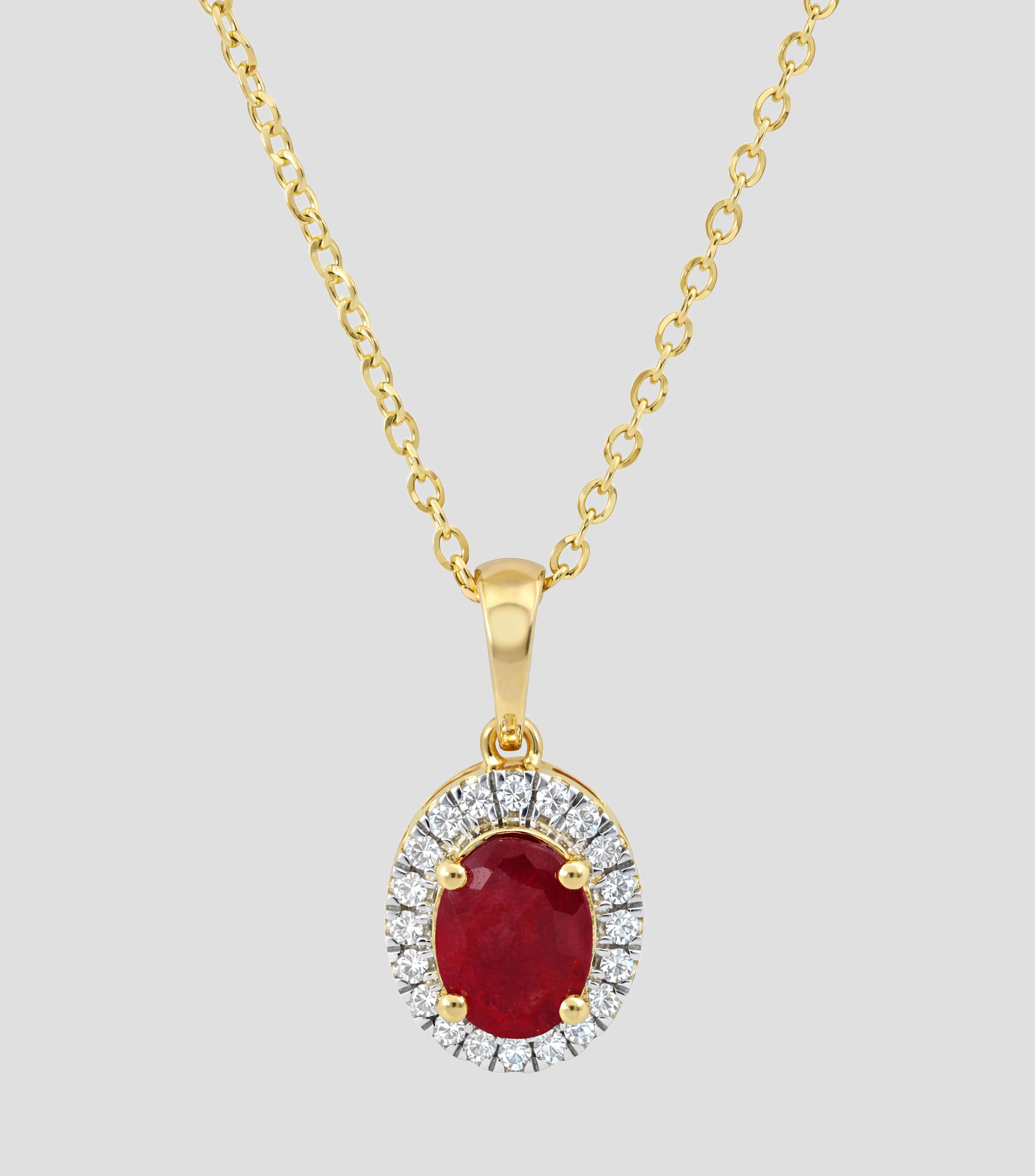 Dije con cadena en Oro de 14 Kilates con brillante y rubí Mujer