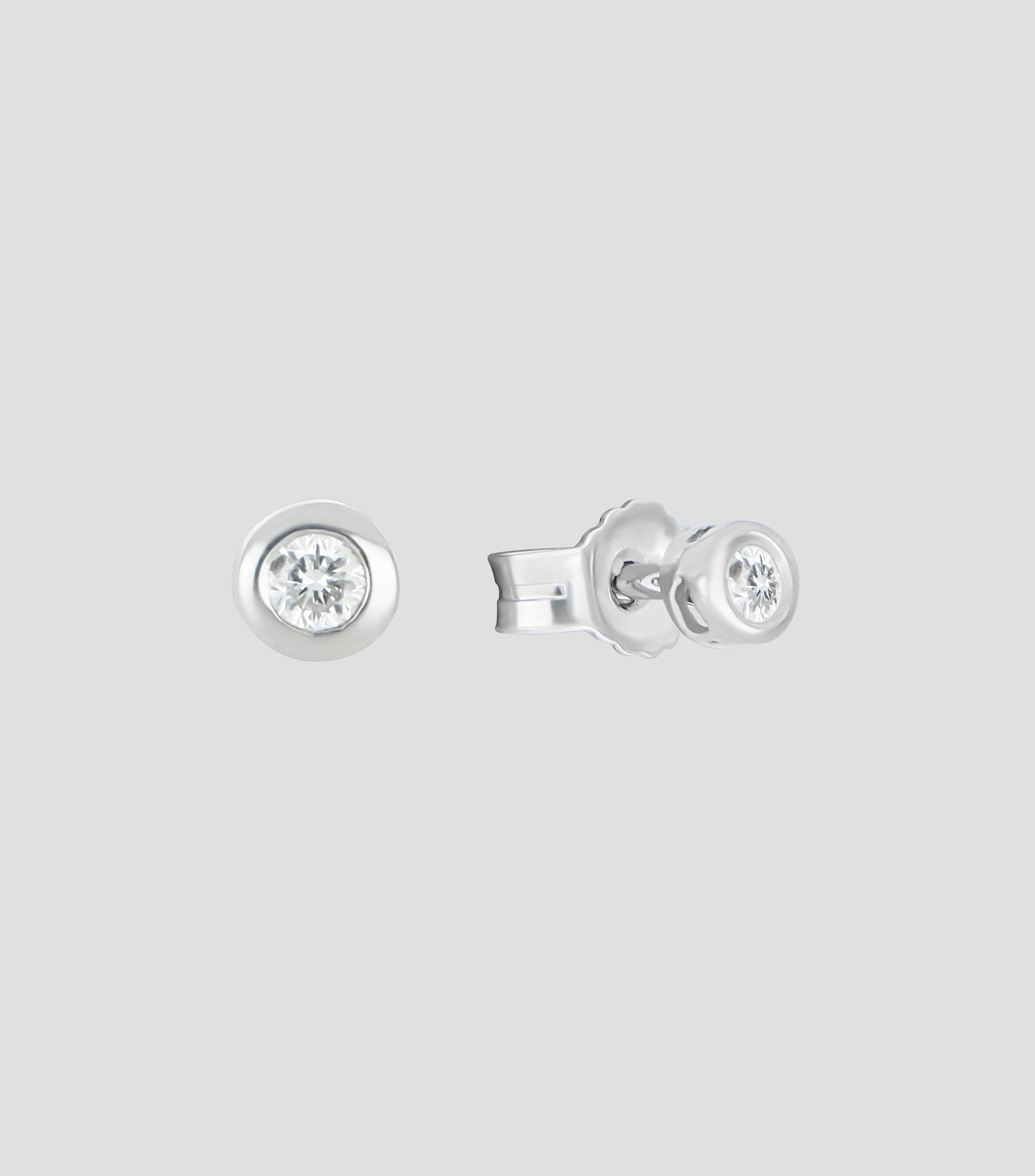 Broqueles en oro blanco de 14 kilates con diamante Mujer