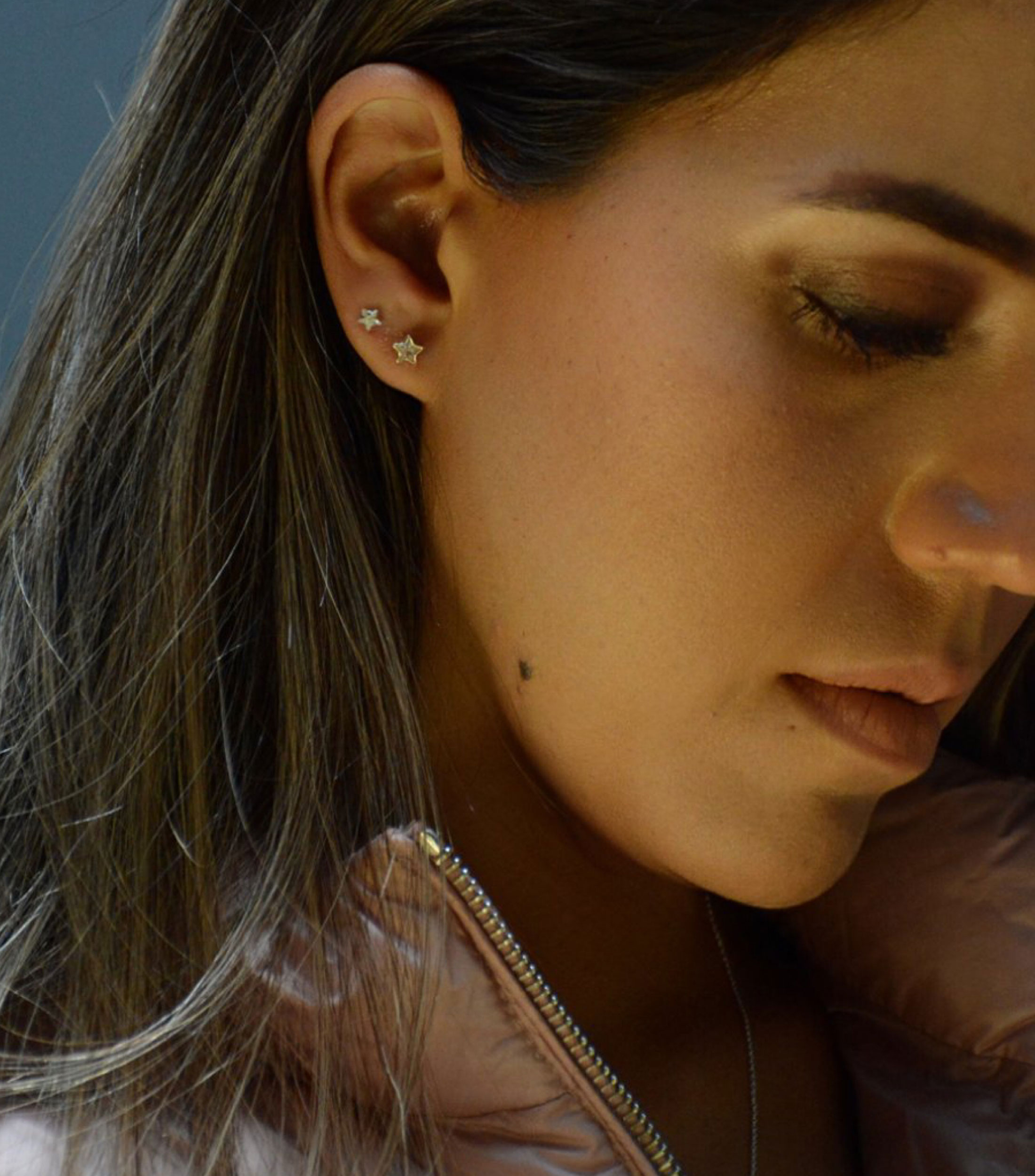 Aretes en oro amarillo de 10 kilates con estrella montada de circonias Niña