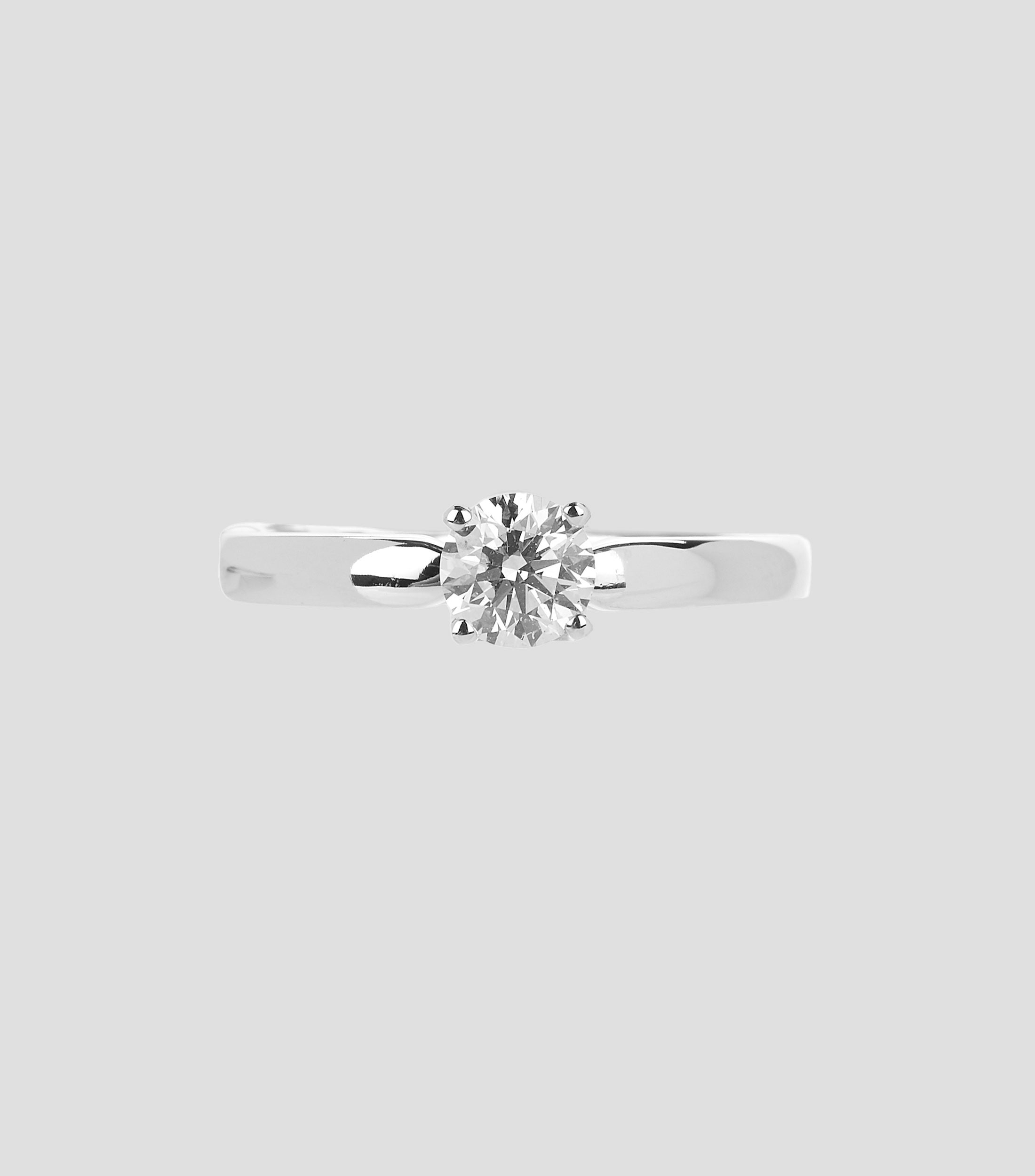 Anillo Solitario en Oro blanco de 14 Kilates con Diamante Incrustado Mujer