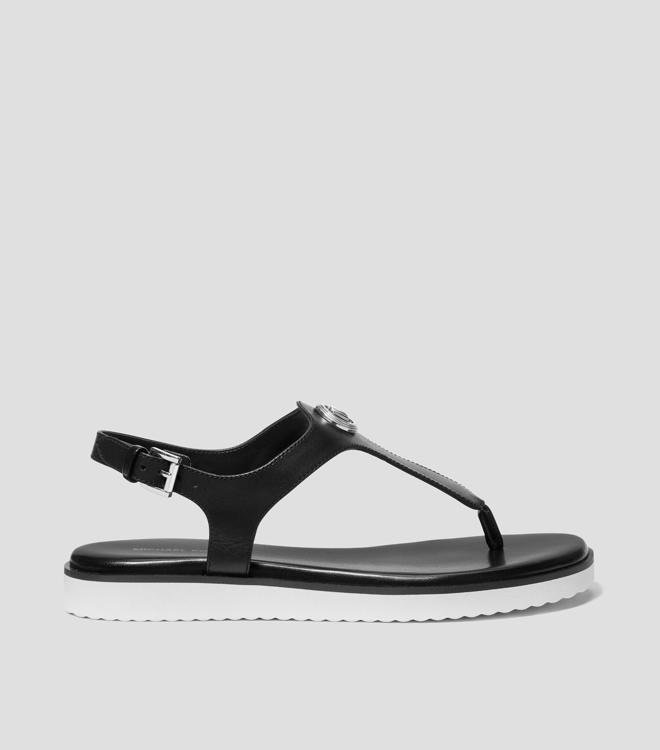 Sandalias Planas en piel Mujer