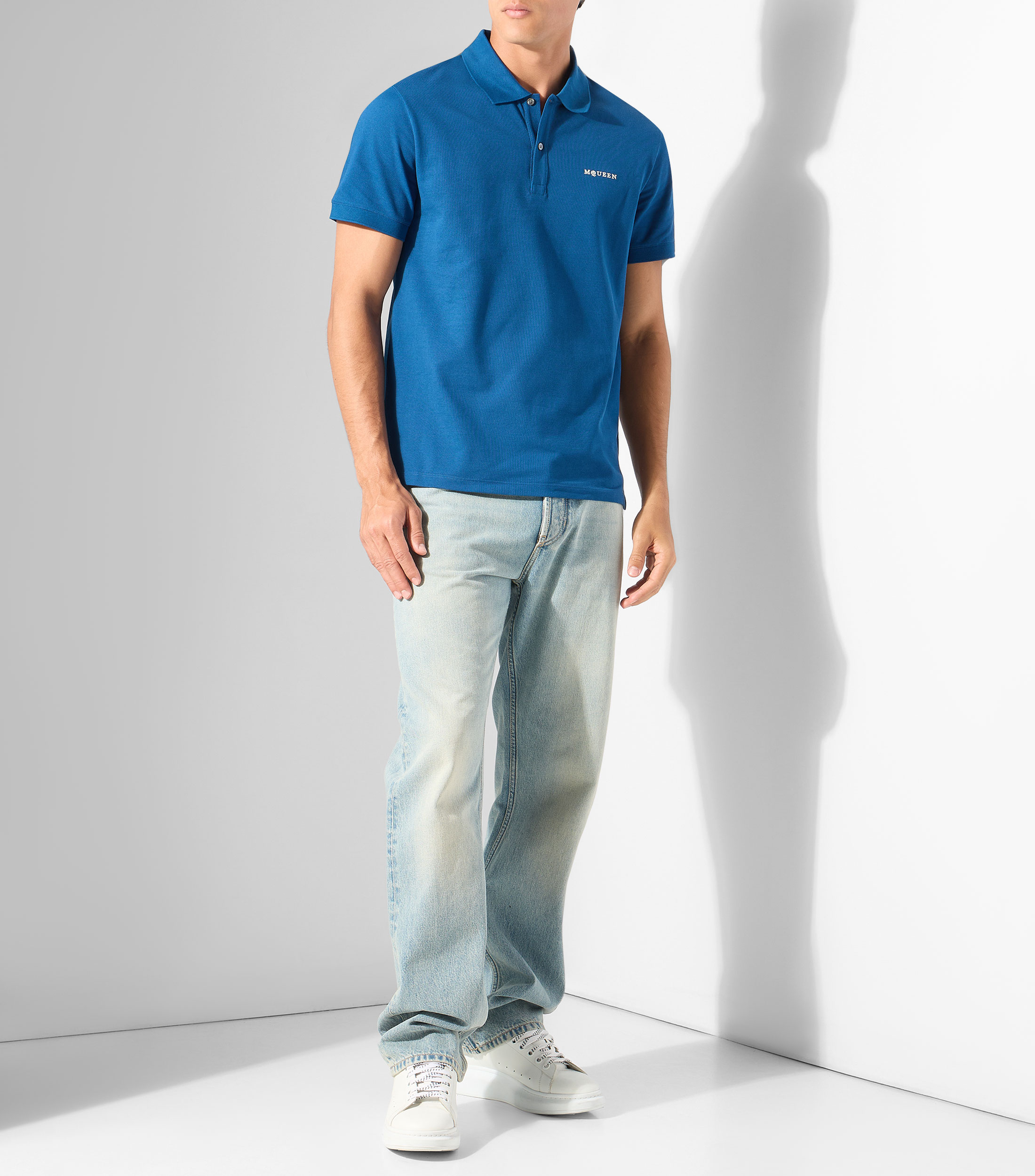 Playera tipo polo con manga corta lisa Hombre