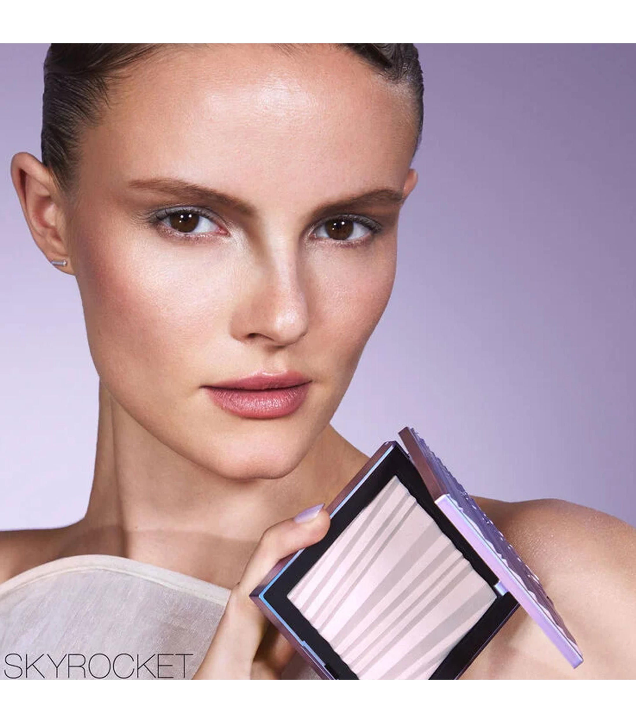 Polvo compacto Aura Illuminating Face & Body Powder, 13 g