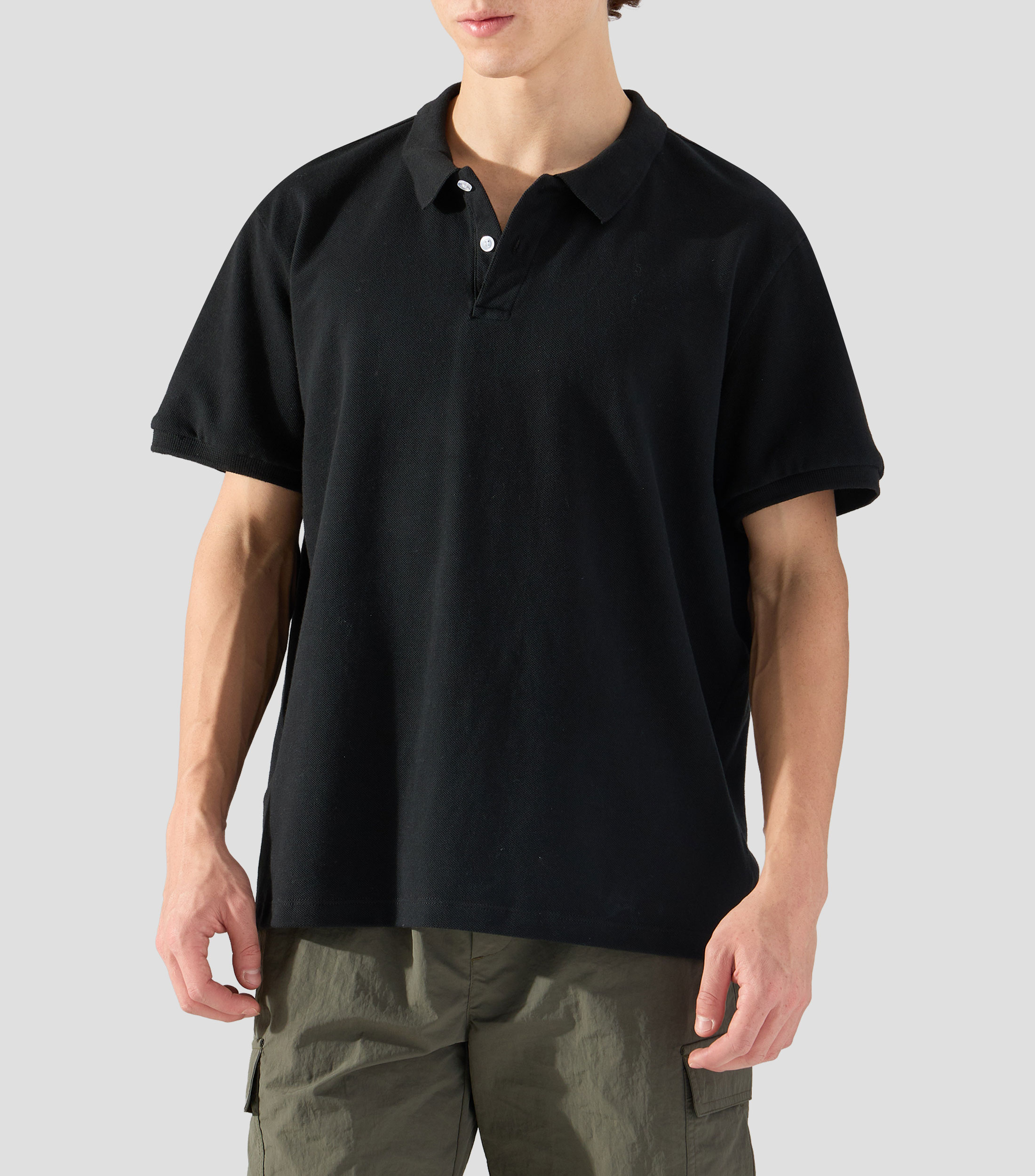 Playera tipo polo con manga corta lisa Hombre