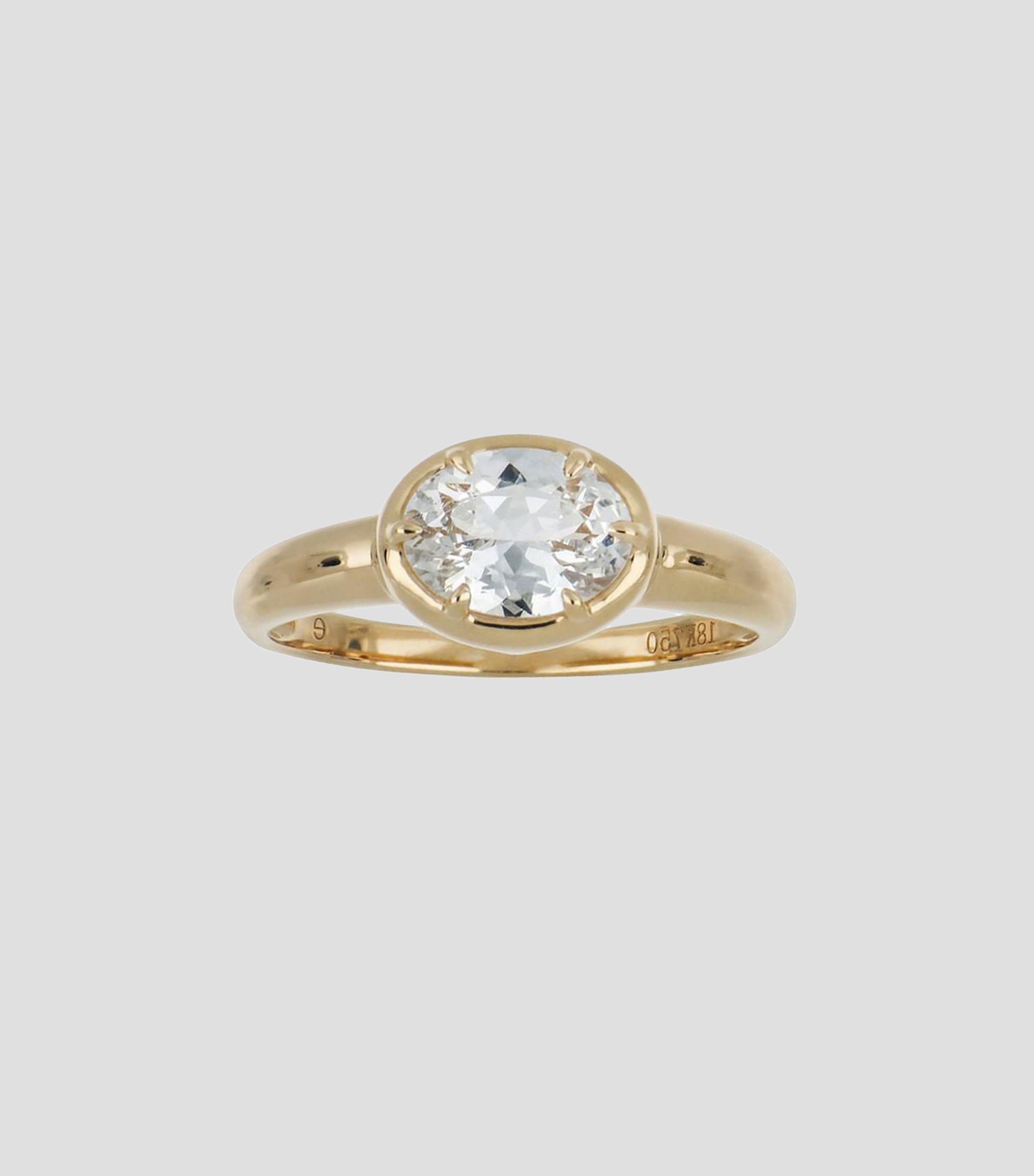 Anillo en oro amarillo 18 kilates con topacio Mujer