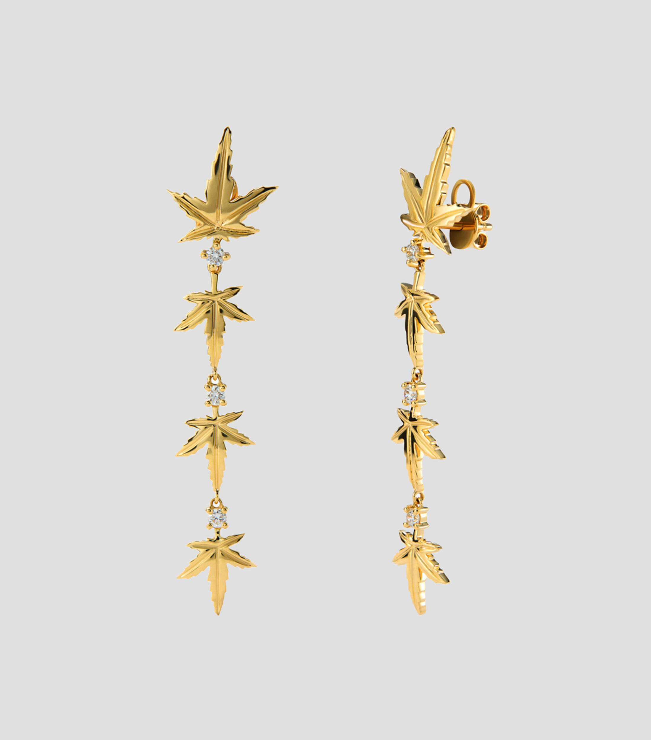 Aretes en oro amarillo con incrustación de diamante Mujer