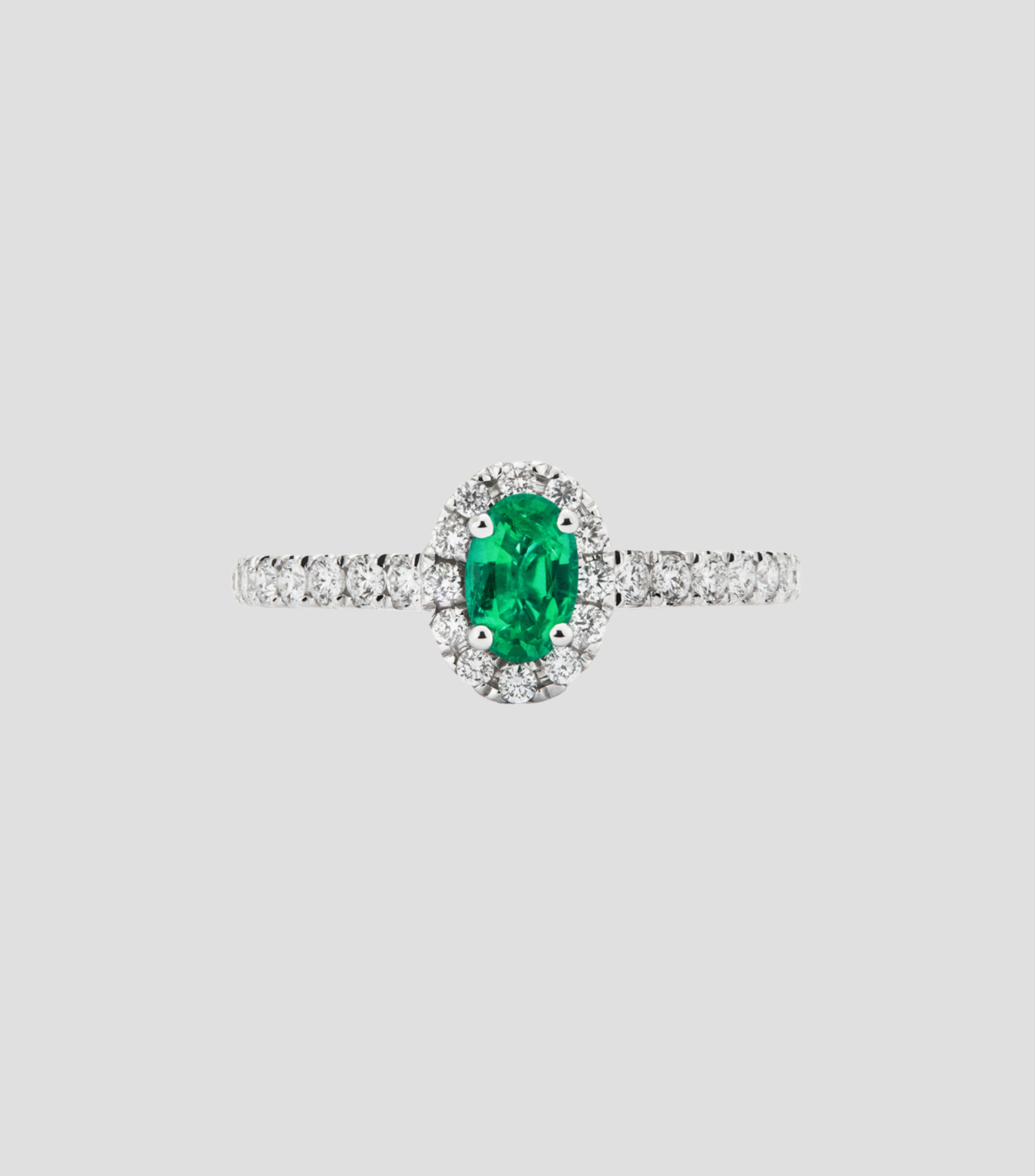 Anillo en oro blanco de 18 Kilates con esmeralda y diamantes Mujer