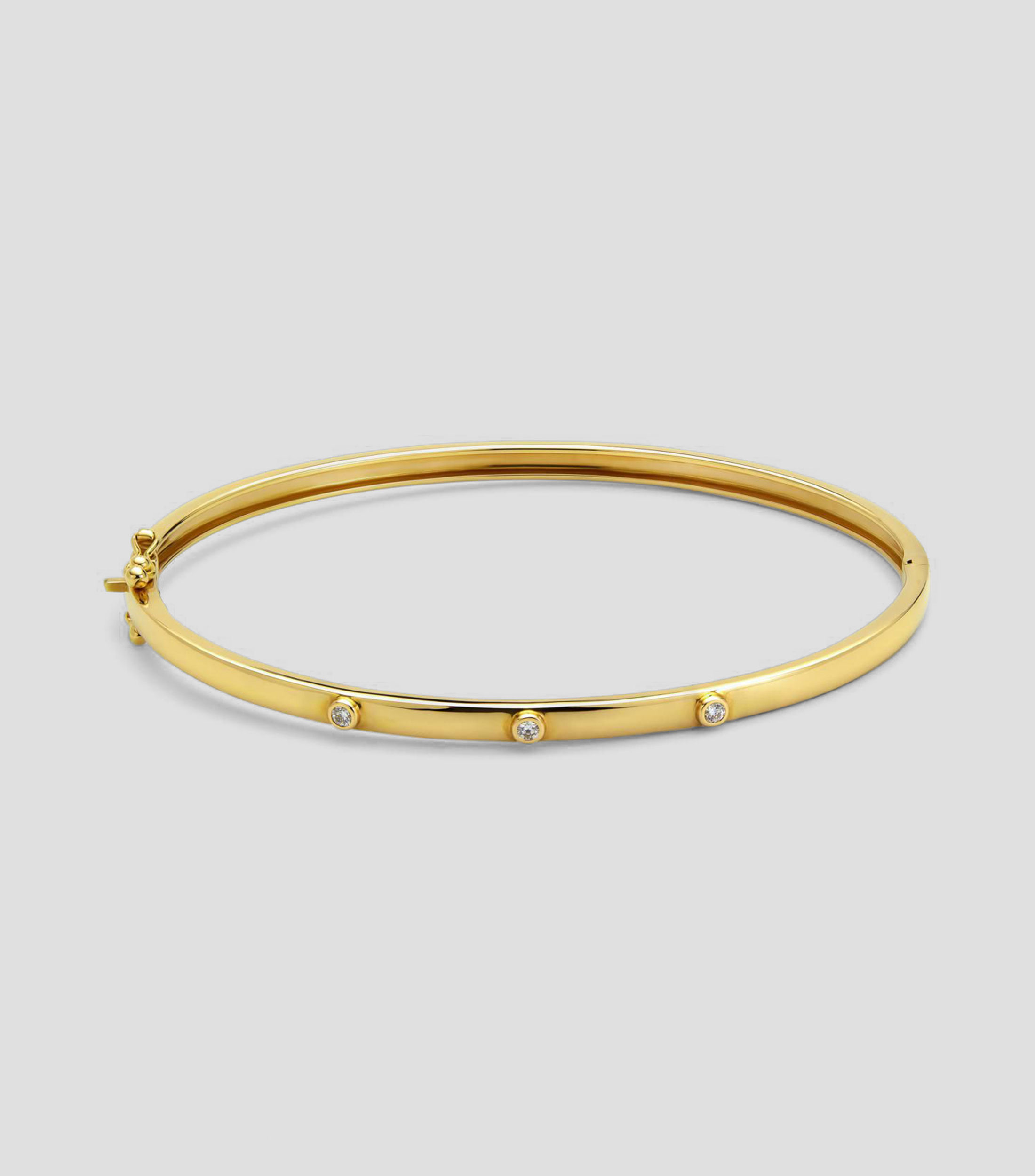 Brazalete rígido en oro amarillo de 18 kilates con diamantes Idalia Mujer