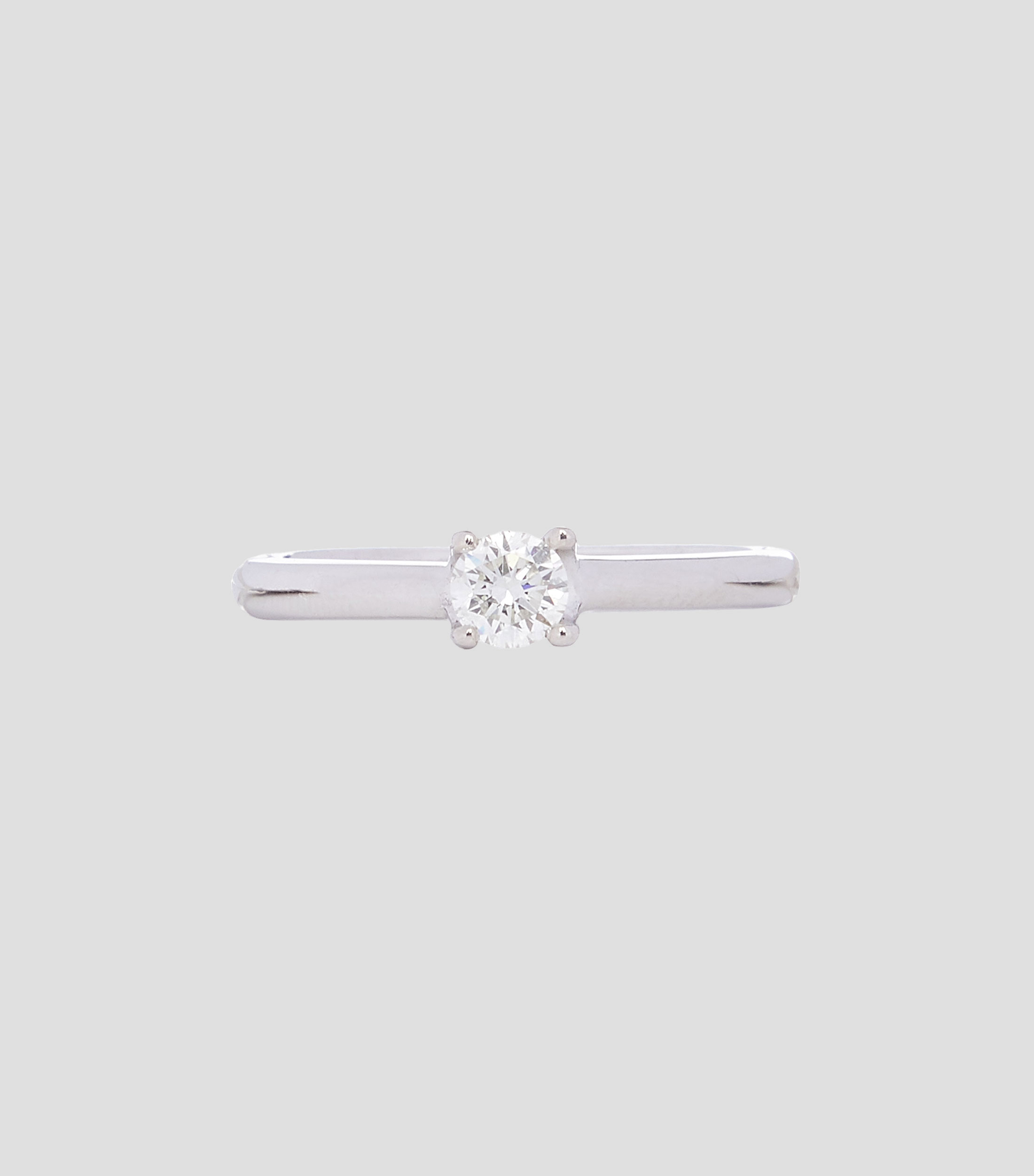 Anillo Solitario en oro blanco 14 Kts con brillante Mujer