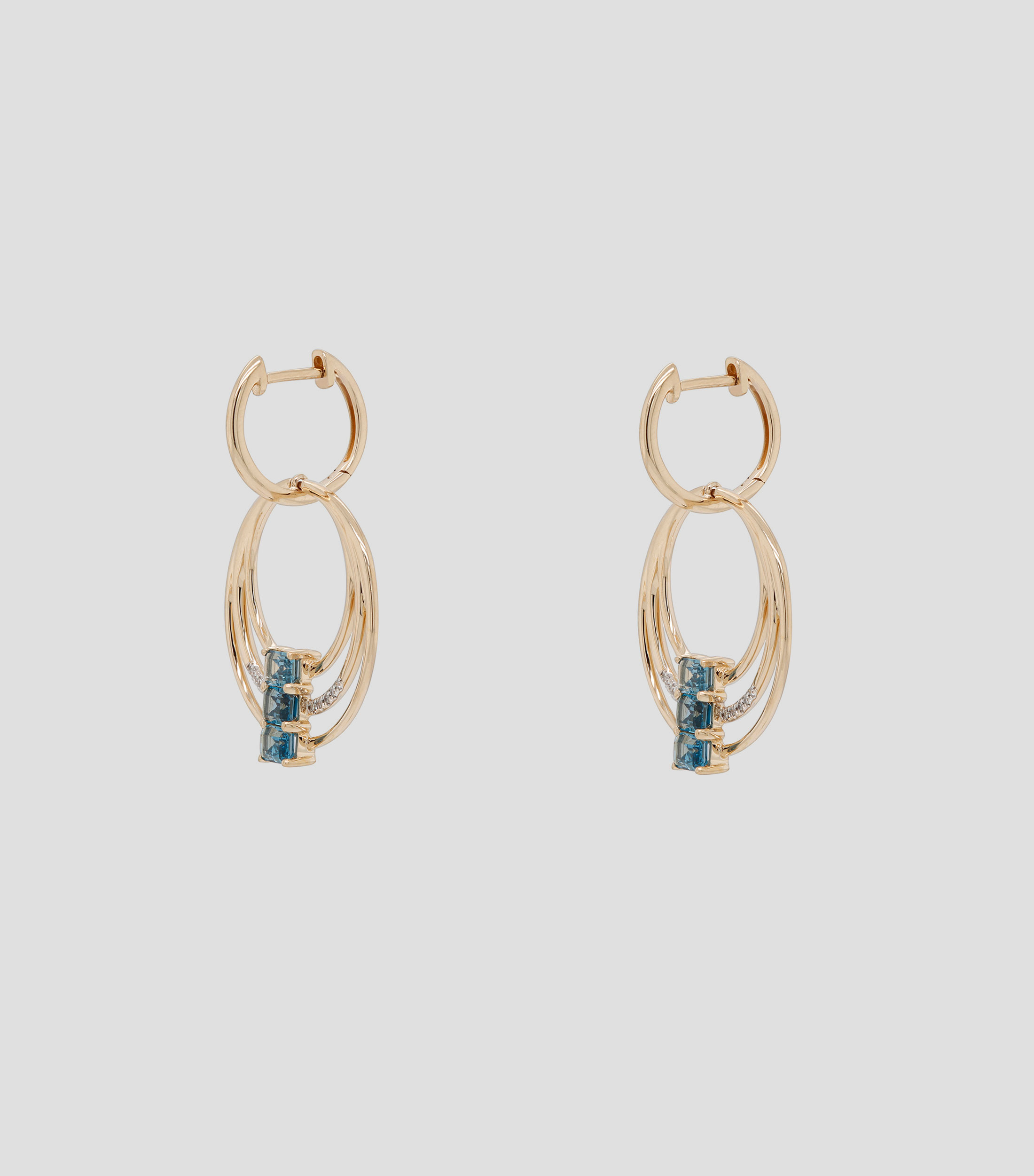 Aretes en oro amarillo de 14 Kts con diamantes y topacio azul Mujer