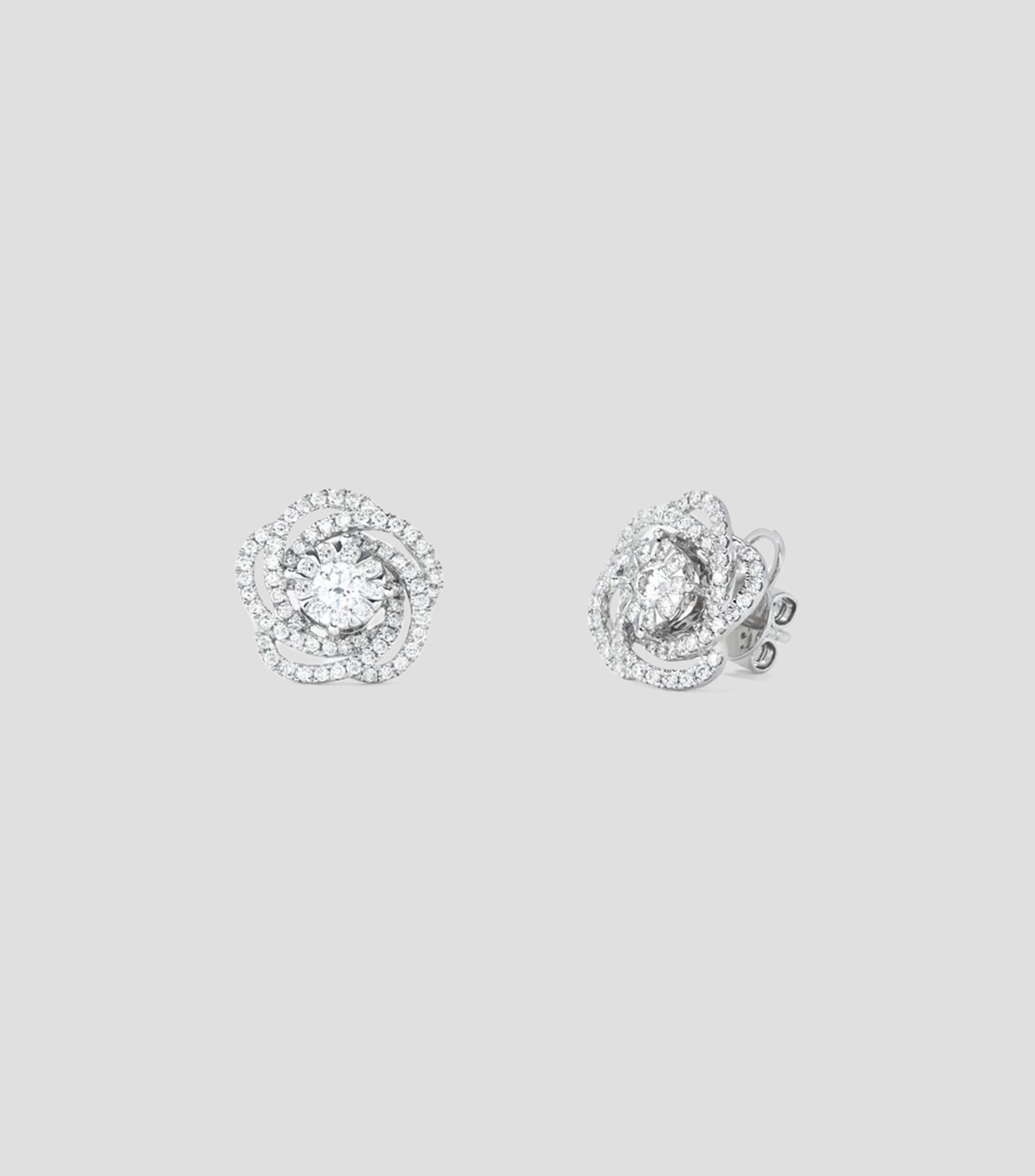 Aretes en Oro blanco de 18 Kilates con diamantes flor Mujer