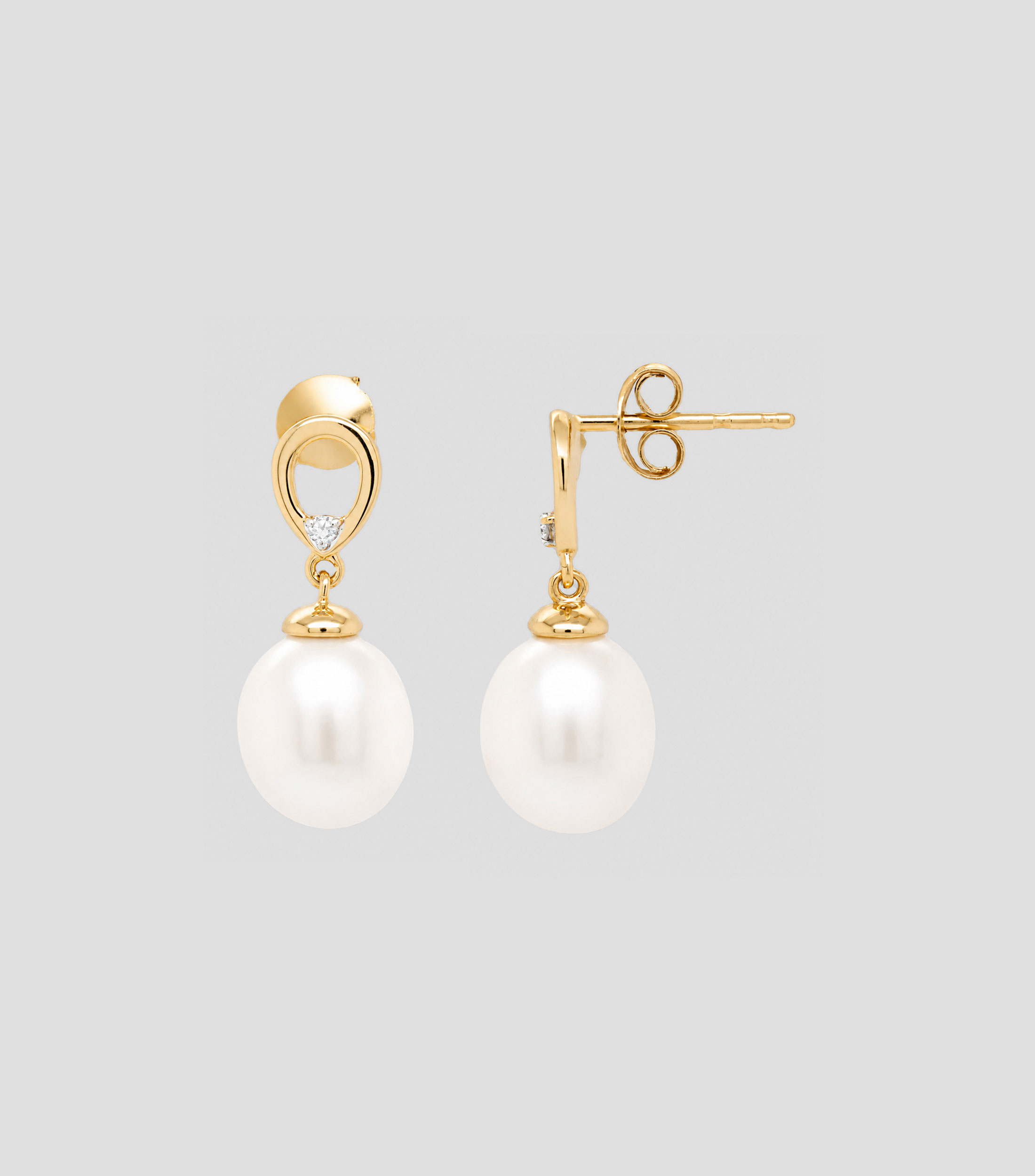 Aretes en Oro de 14 Kilates con Brillante y perla blanca Mujer