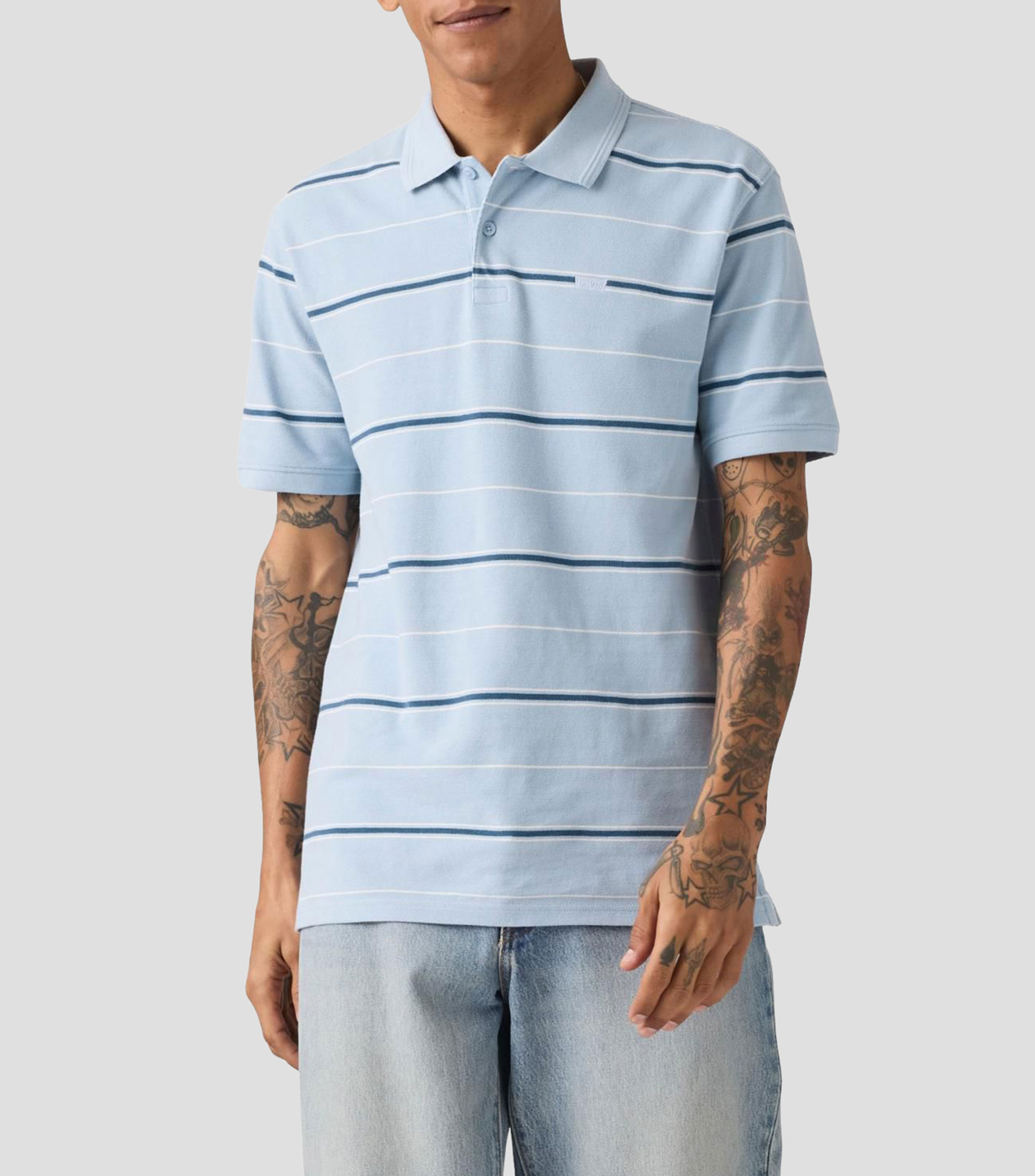Playera tipo polo manga corta a rayas Hombre