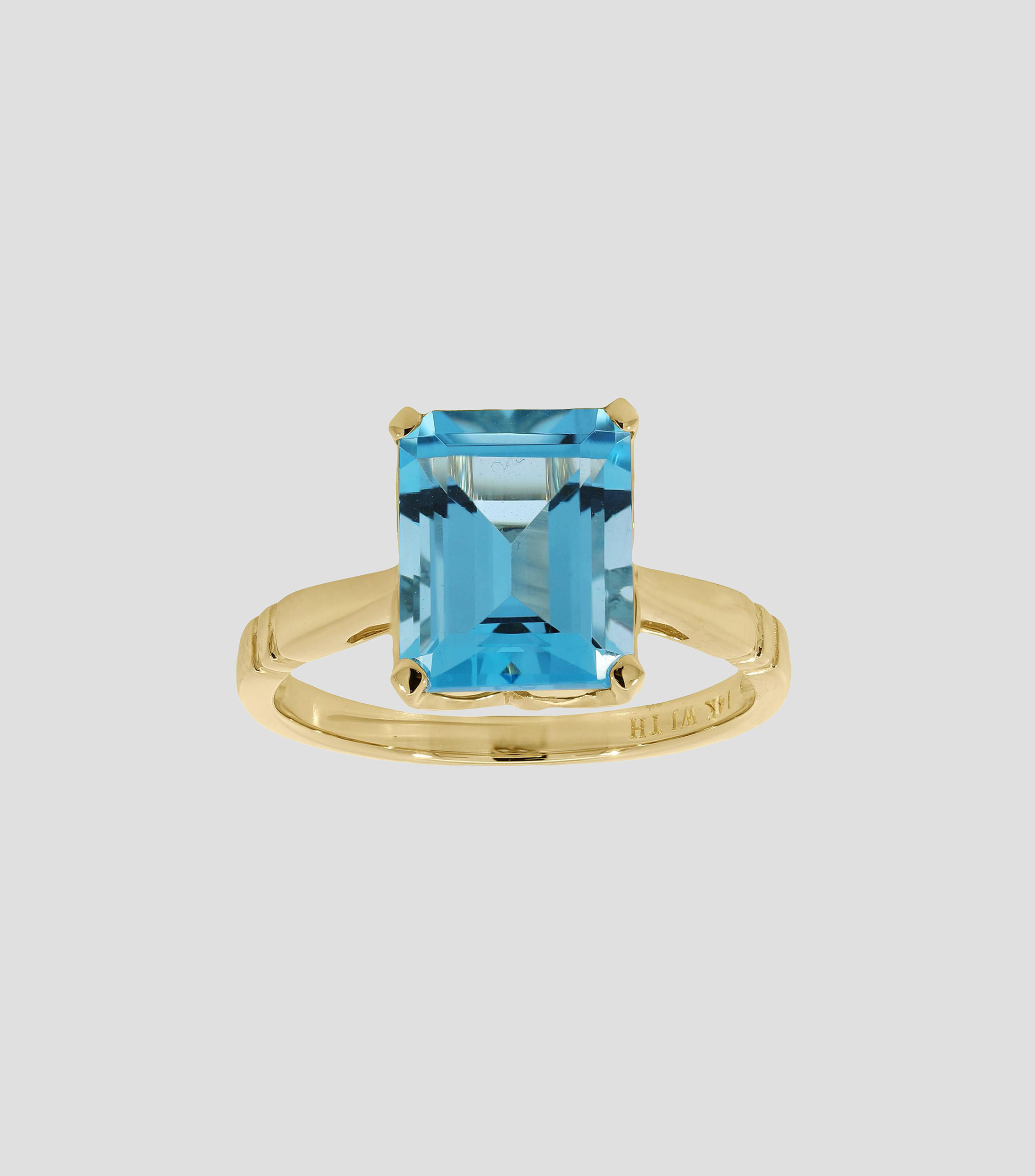 Anillo en Oro amarillo de 14 Kilates con topacio Mujer