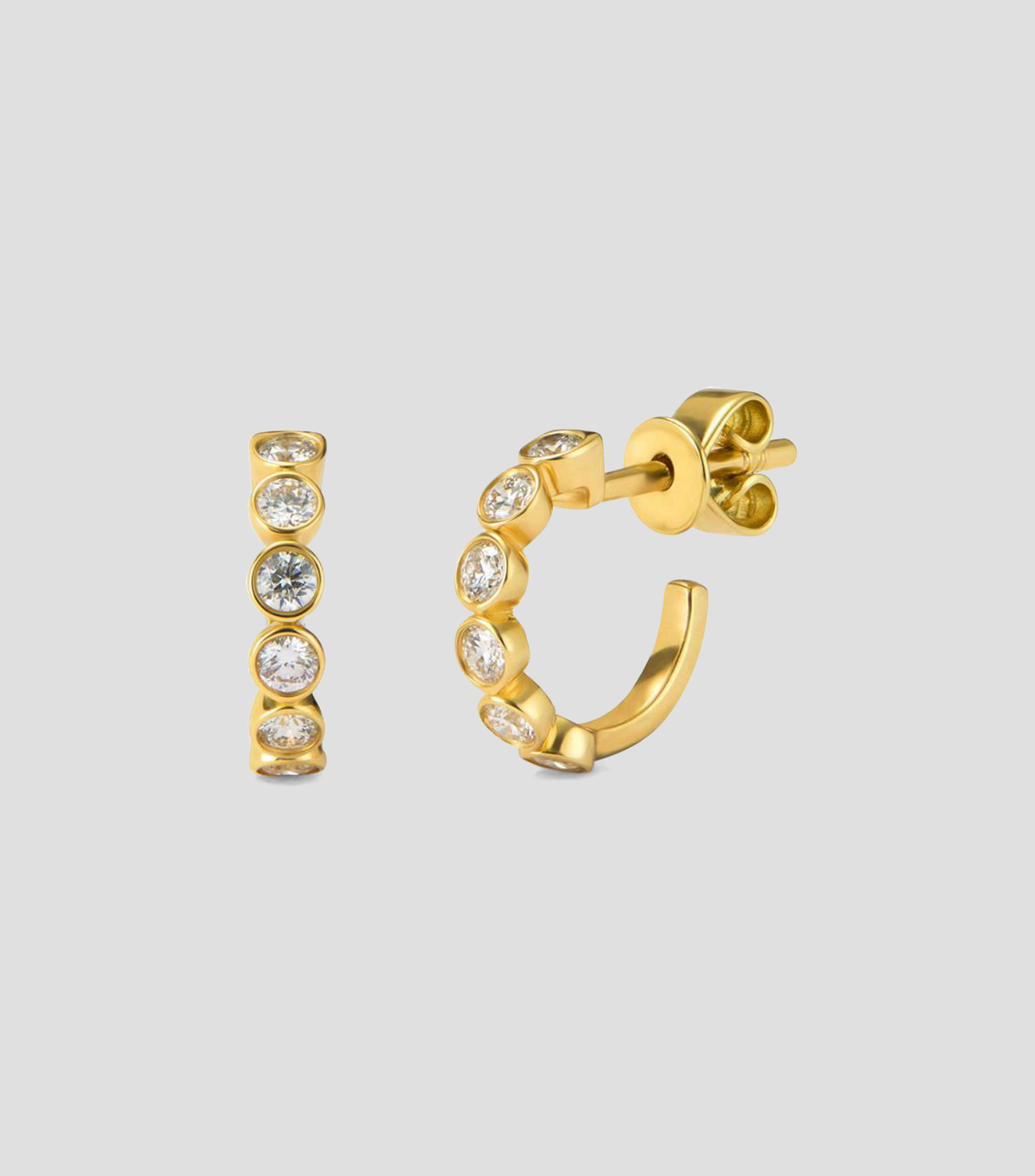 Aretes de aro en Oro amarillo de 18 Kilates con 12 diamantes en talla brillante Mujer