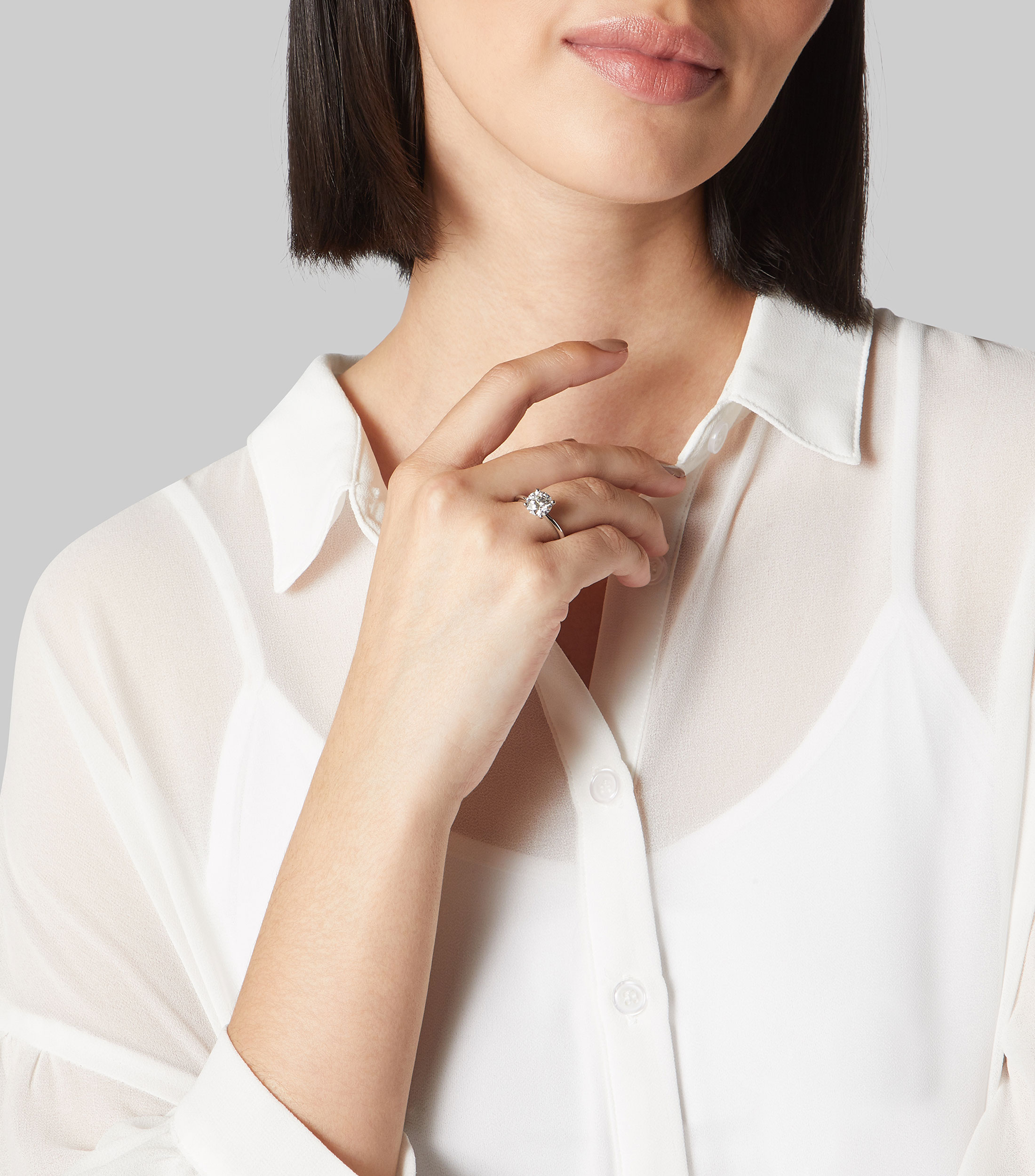 Anillo solitario en oro blanco de 14 kilates con diamante Mujer