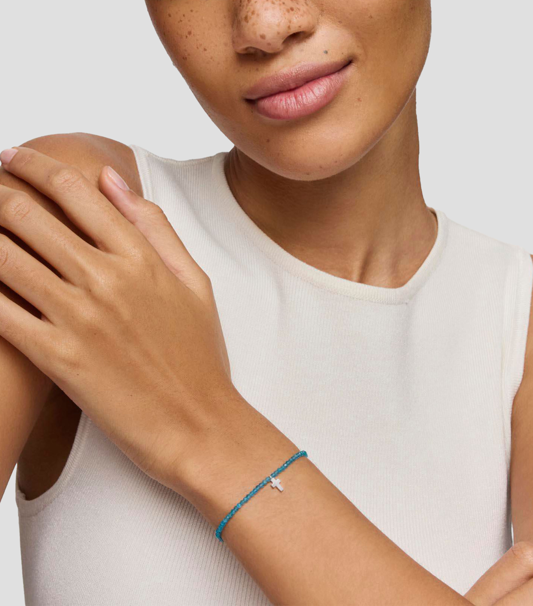 Pulsera elástica con cruz Mujer