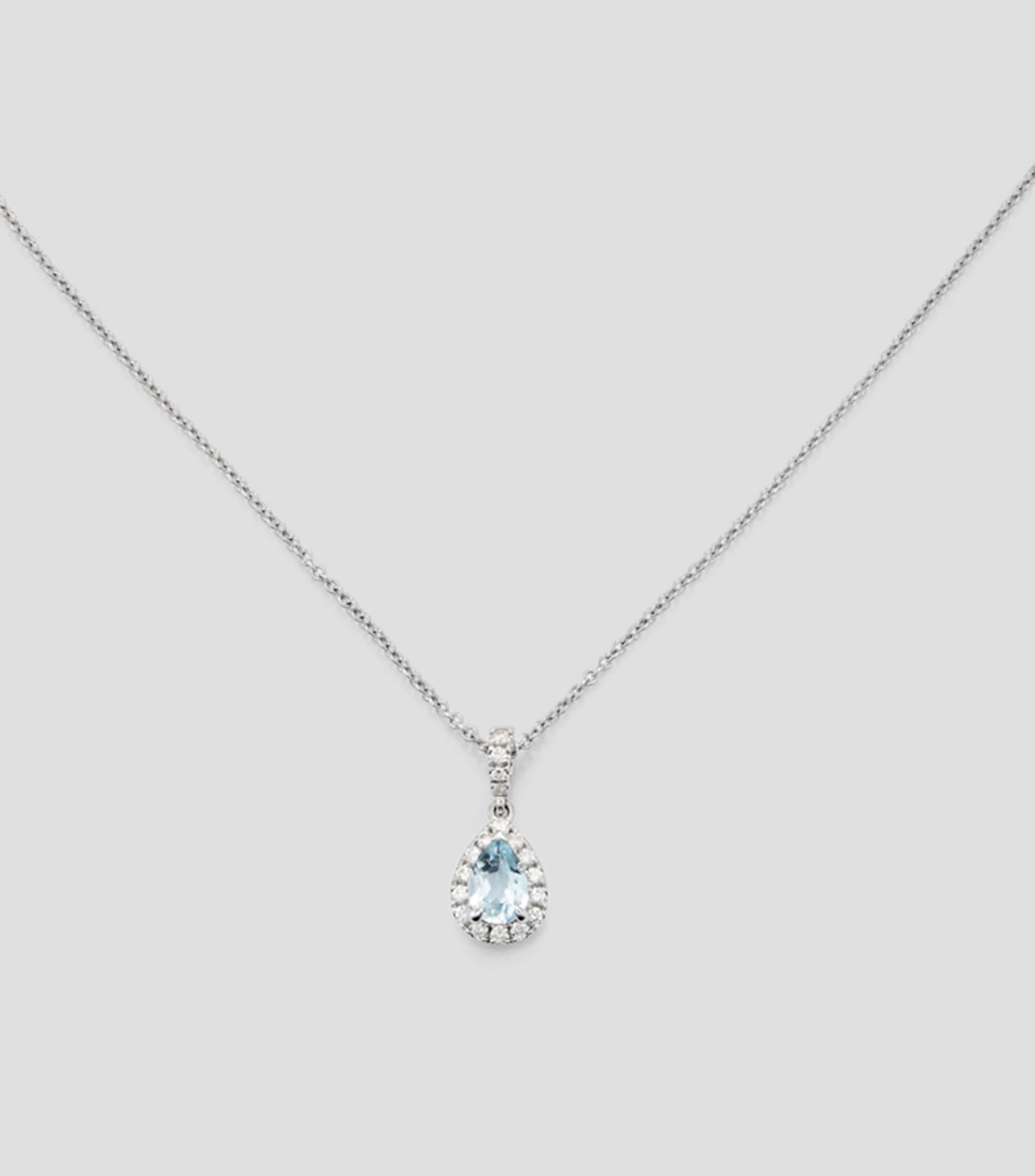 Colgante cadena de oro blanco de 18K con topacio