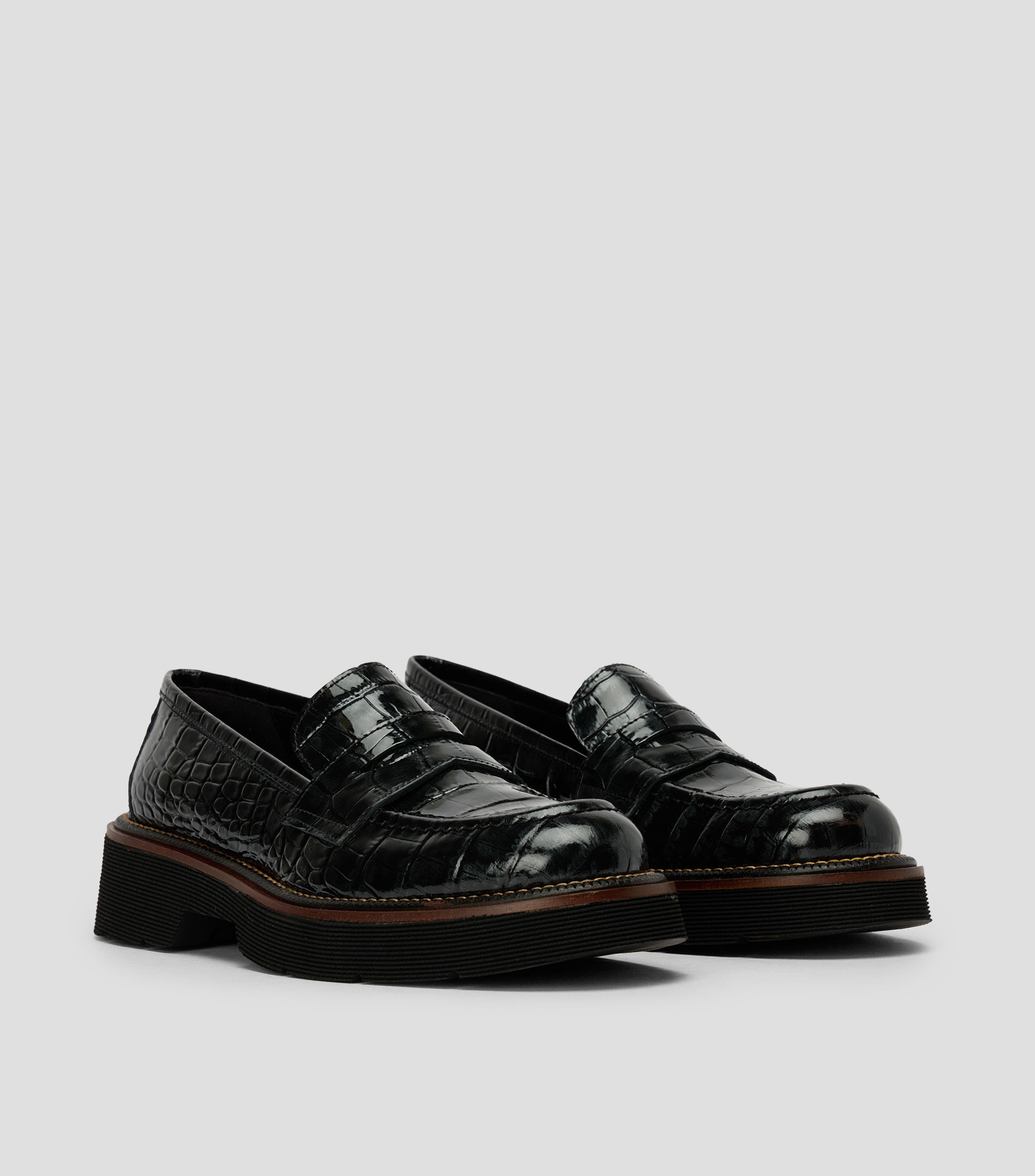 Mocasines con tacón bajo ancho en piel animalskin Mujer