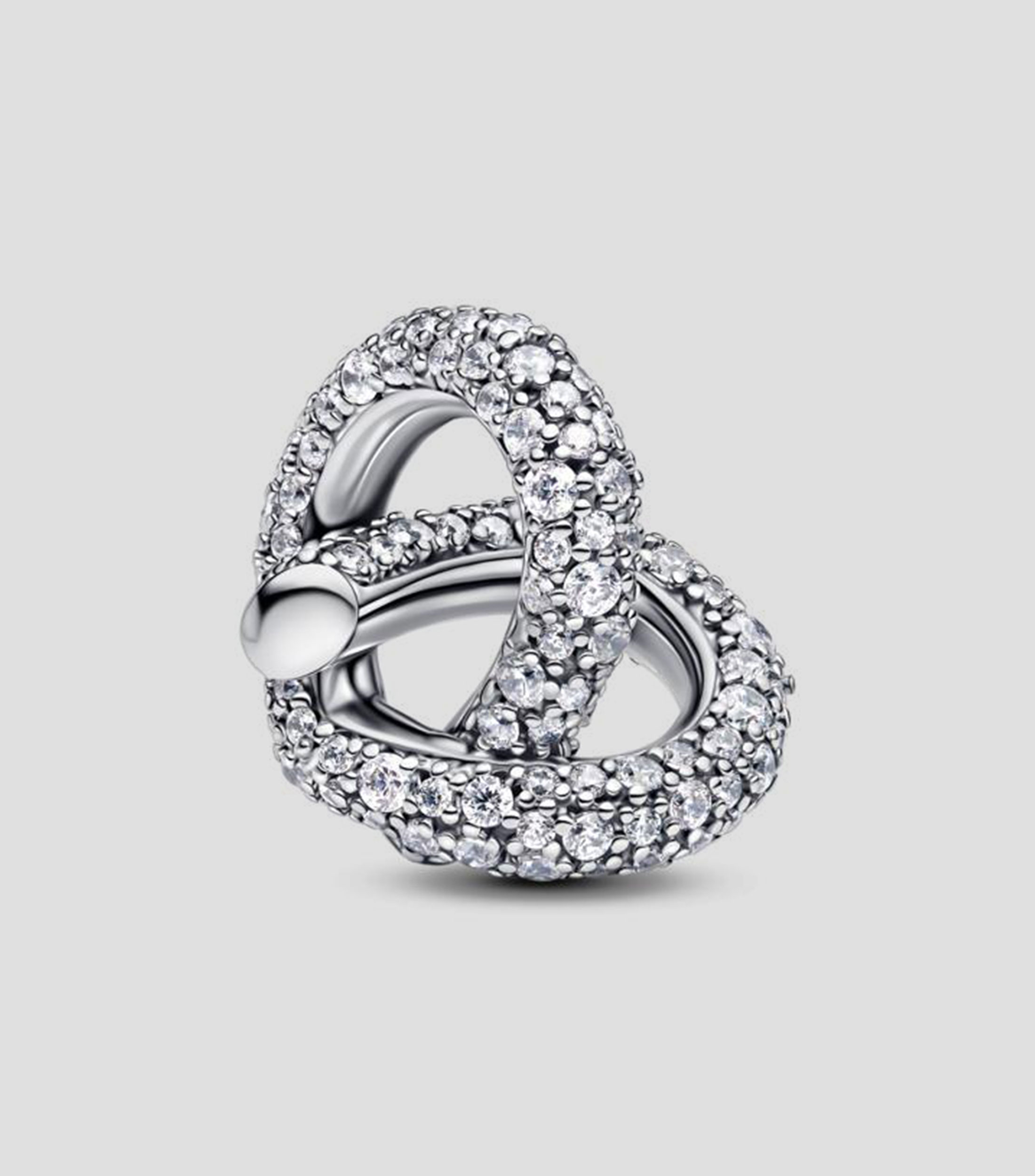 Charm Infinity Knot Heart en Plata .925 con Zirconias Unisex