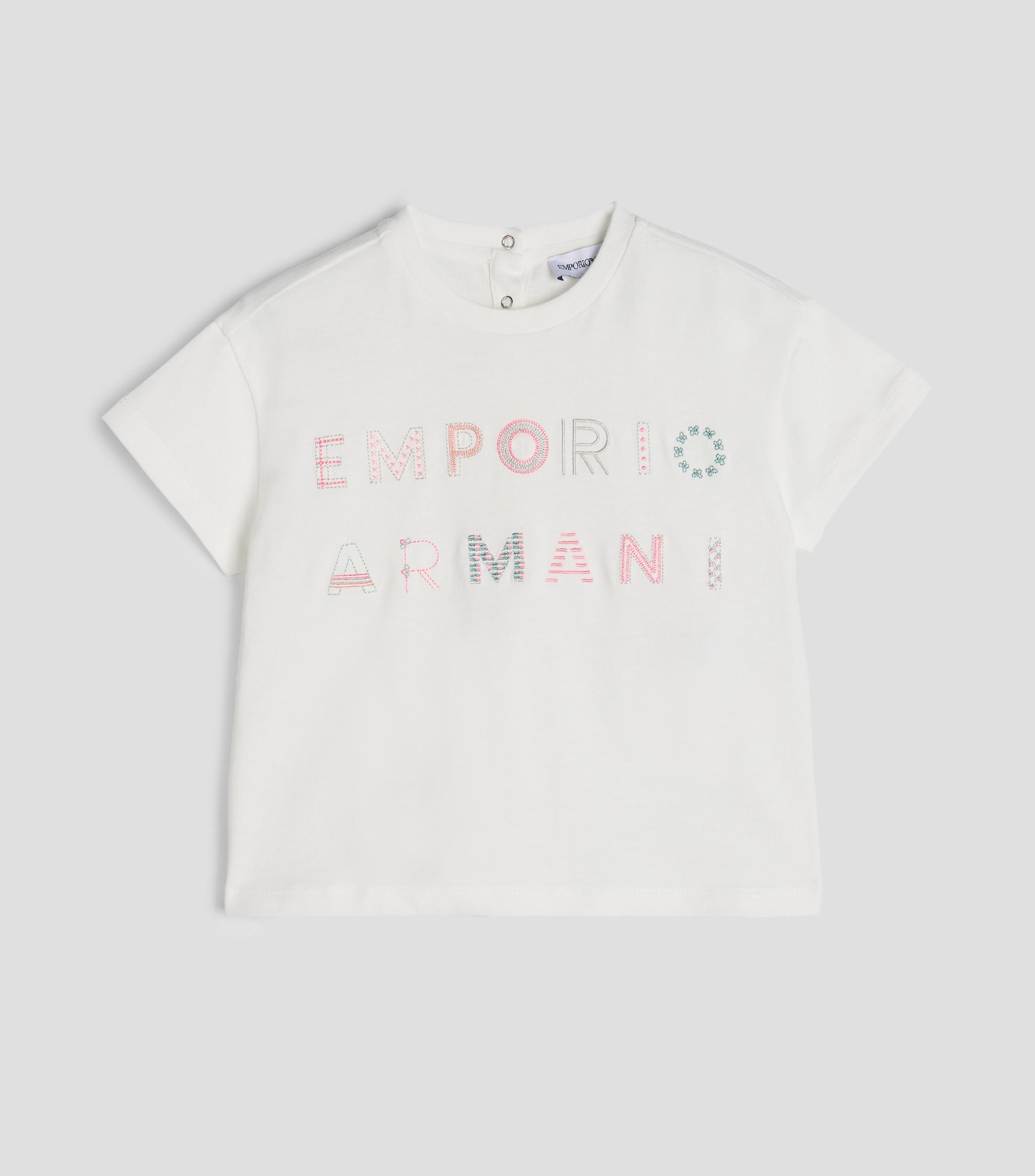 Playera de cuello redondo con manga corta con bordado Niña