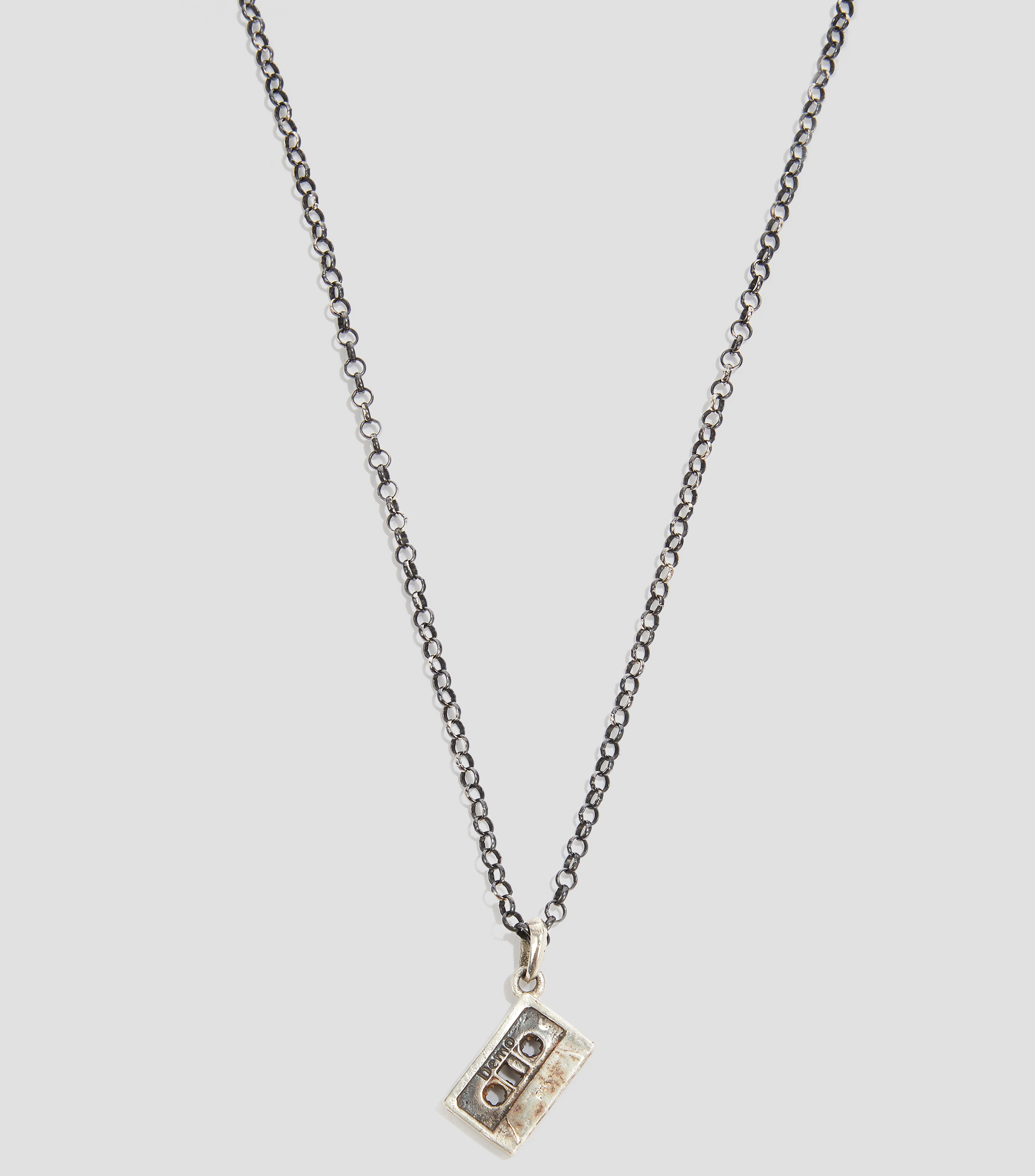 Dije casete en plata Hombre