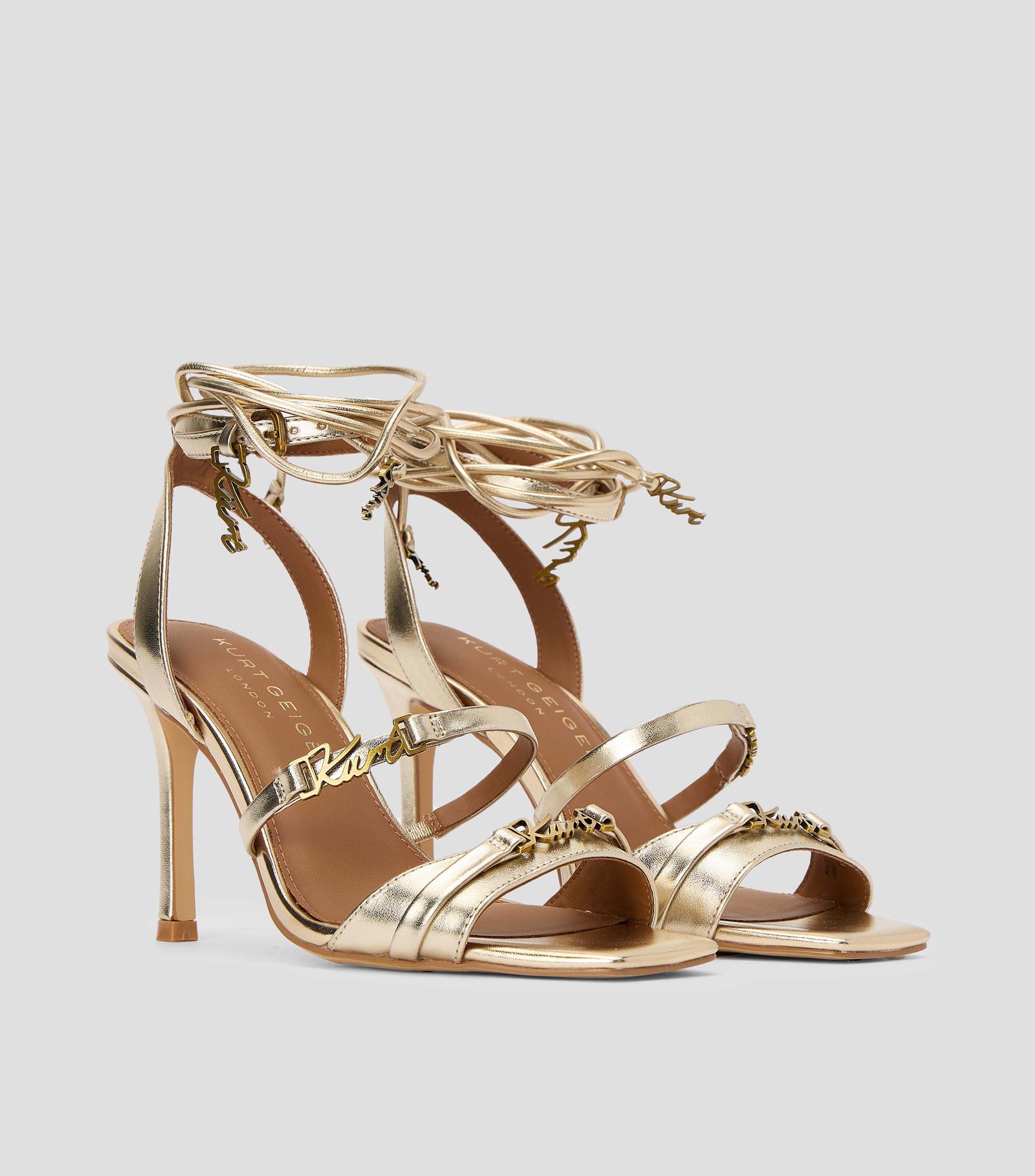 Sandalias con tacón alto y delgado Mujer