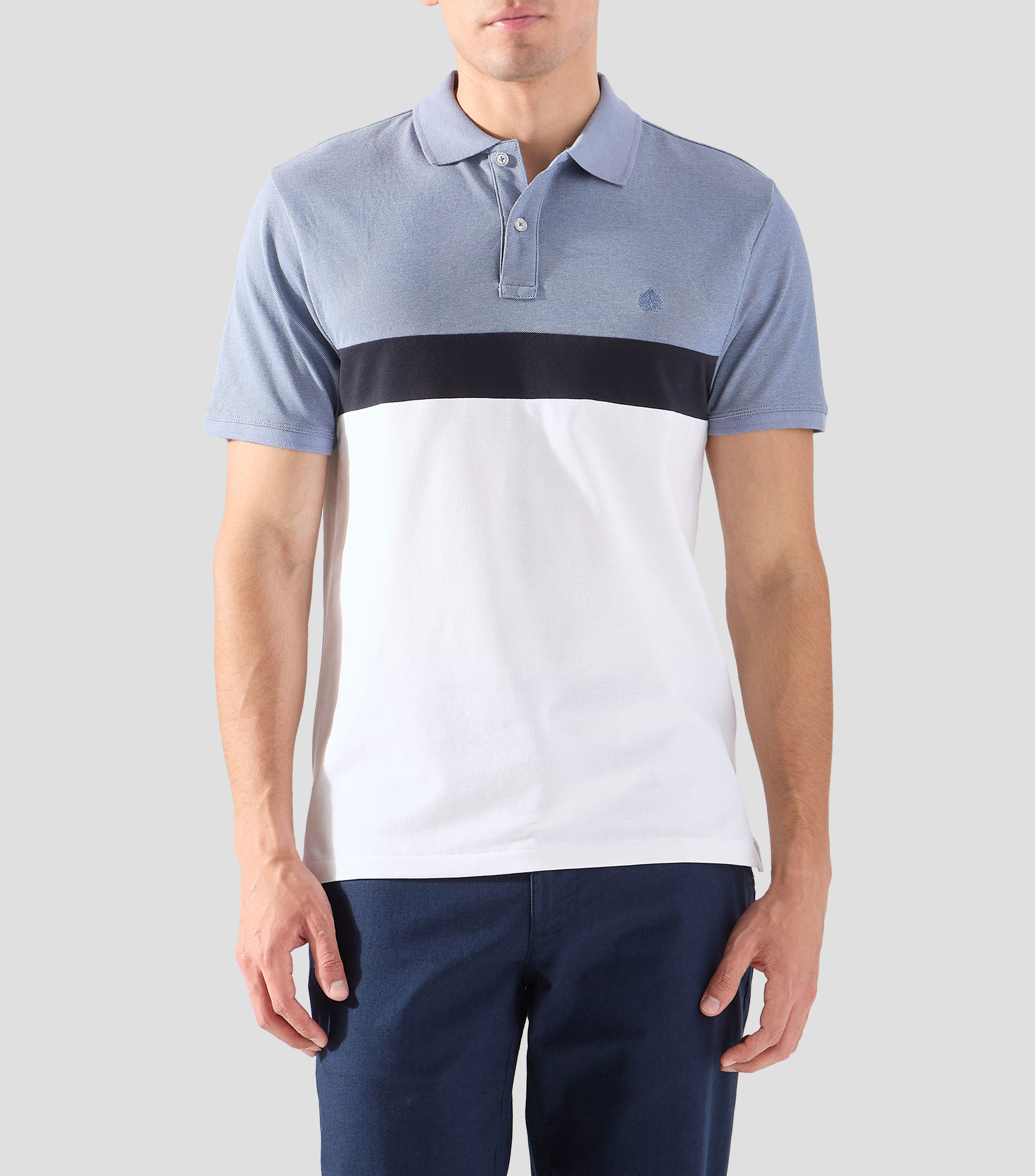 Playera tipo polo manga corta con bloques de color Hombre