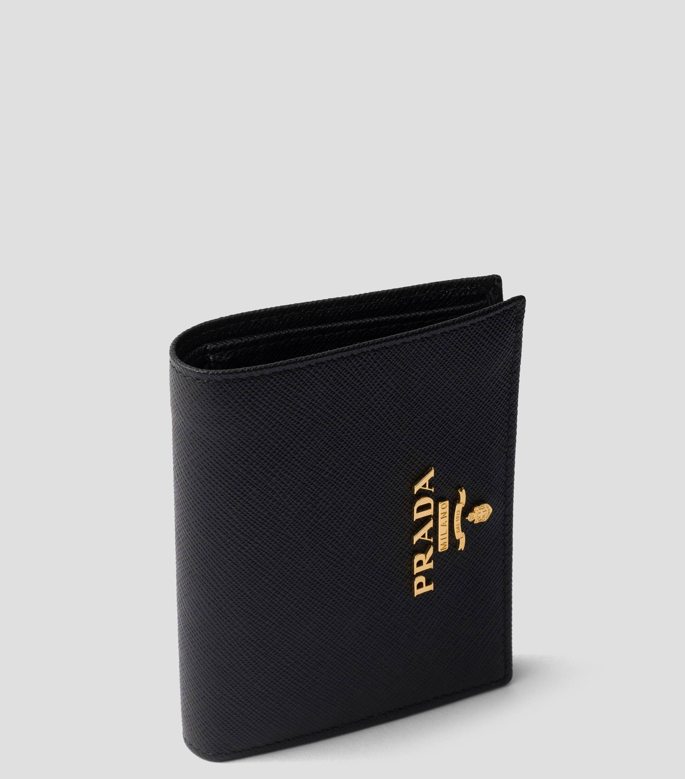 Cartera en piel con detalle texturizado Mujer