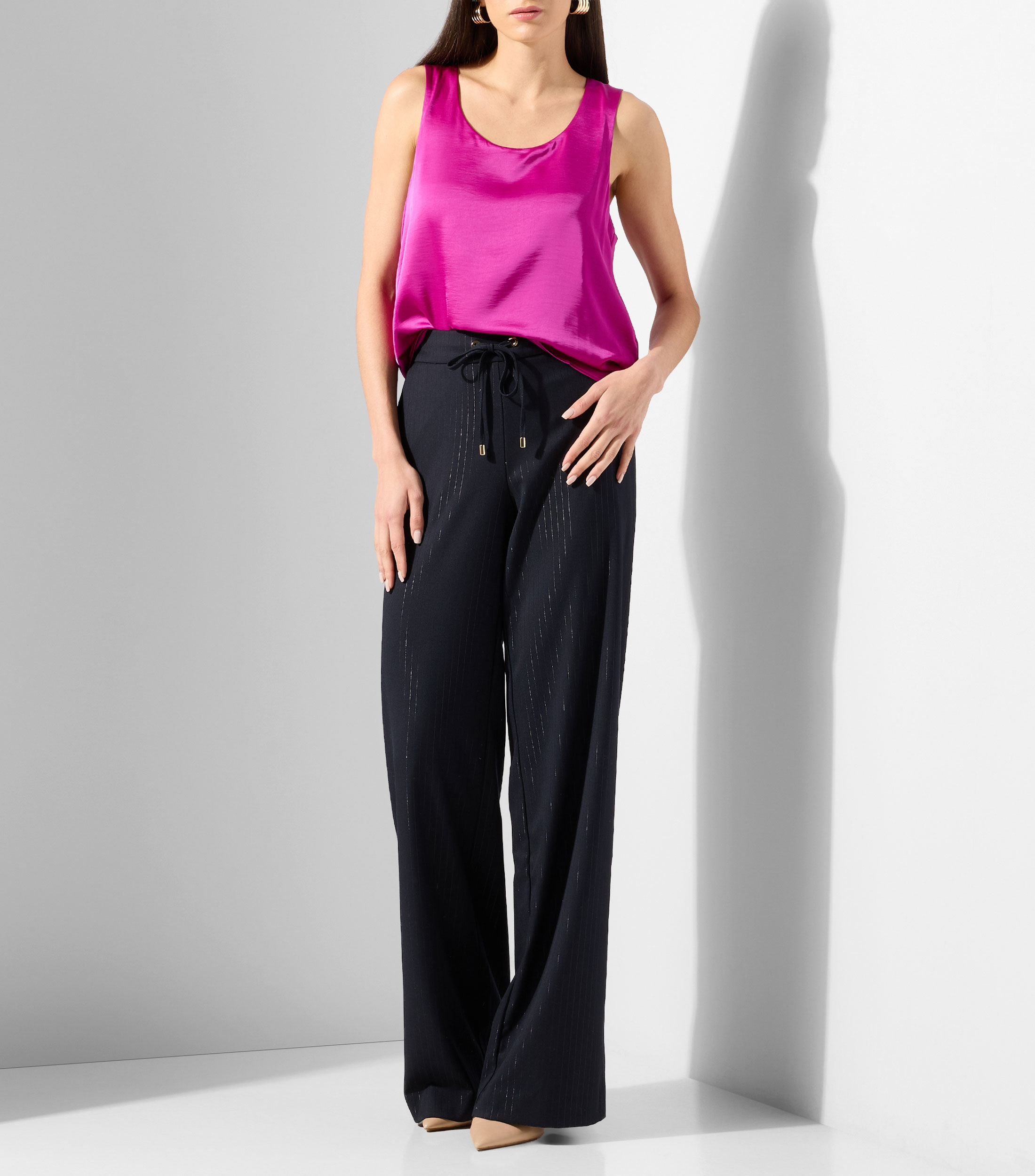 Blusa lisa sin mangas Mujer