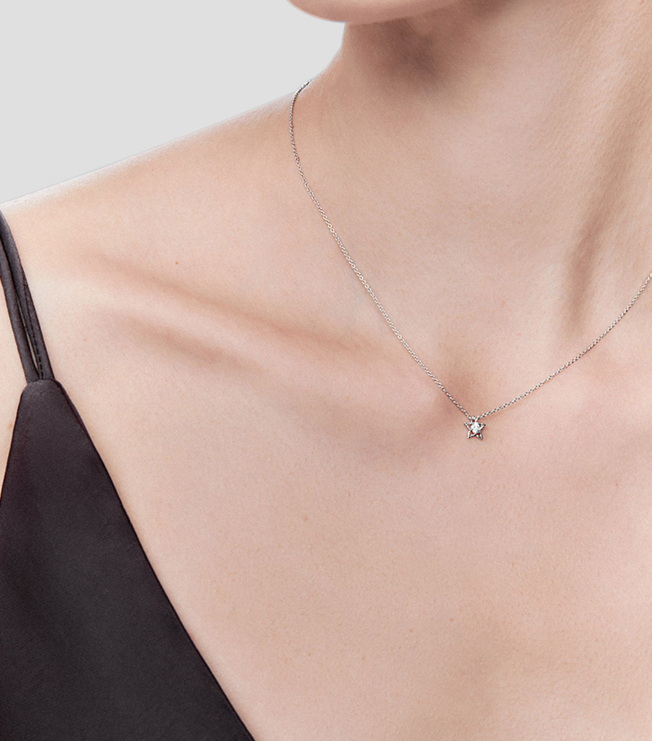Dije estrella con cadena en oro blanco 18 Kilates Grace Mujer