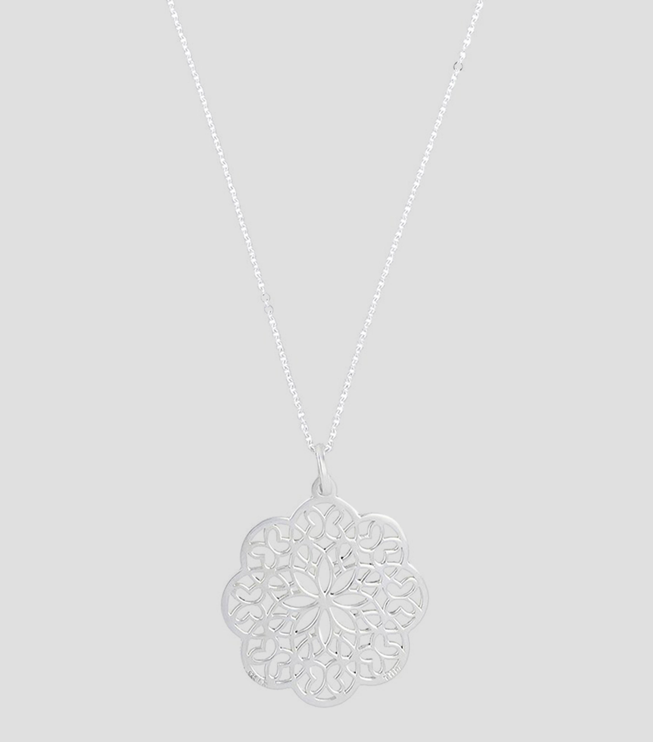 Dije en plata Mujer