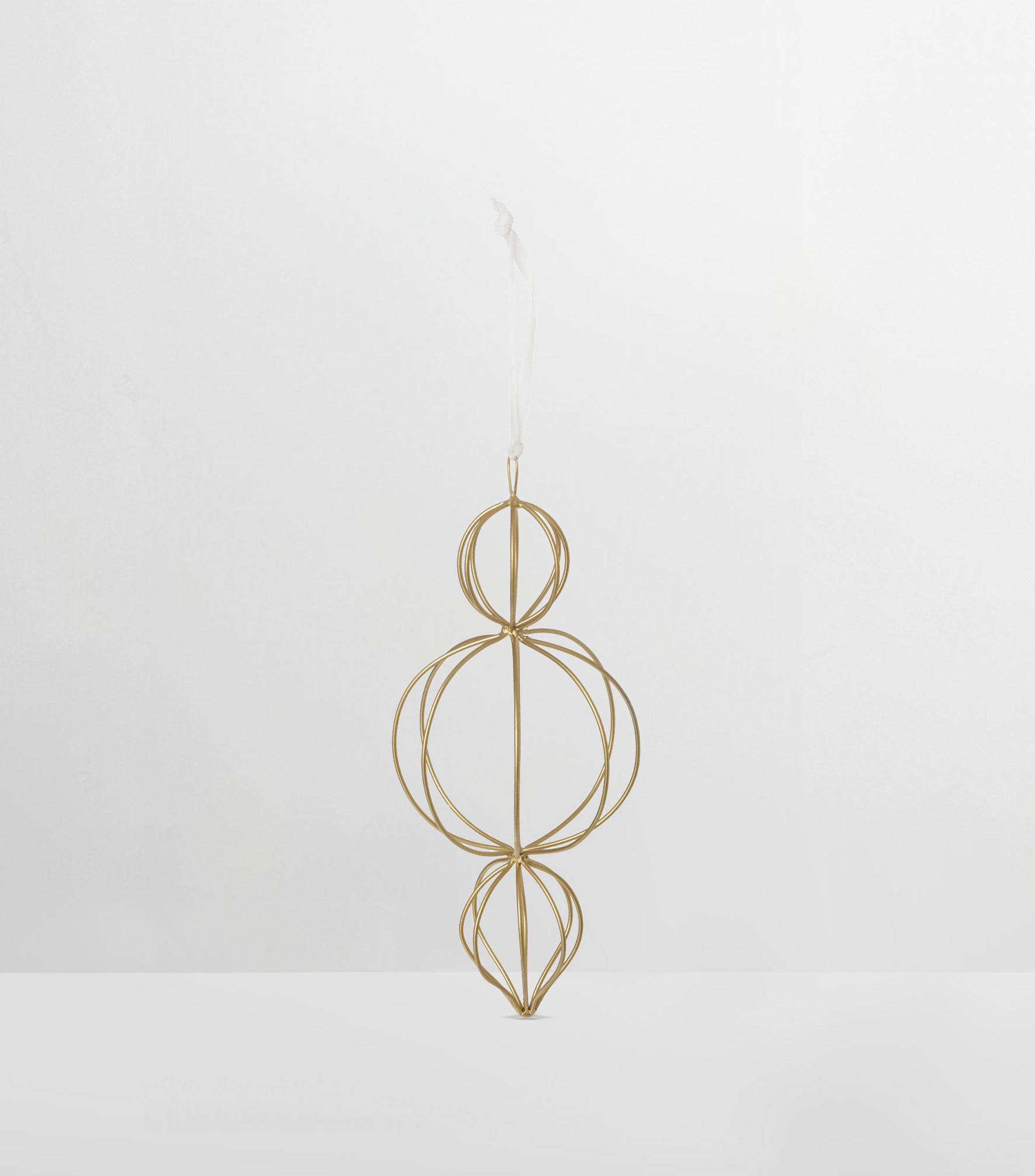Ornamento silueta chirimbolo en Metal