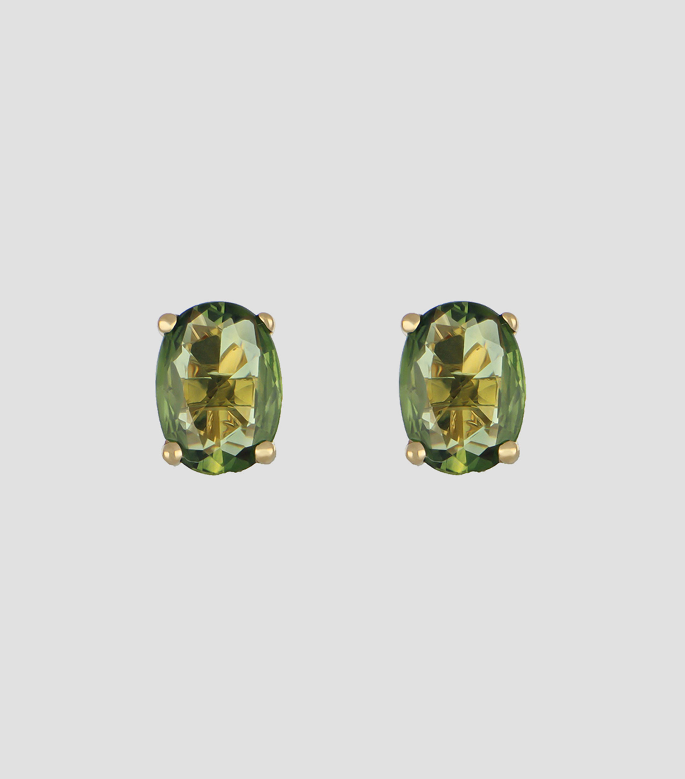 Broqueles en oro amarillo de 18 kilates con zafiro verde Mujer