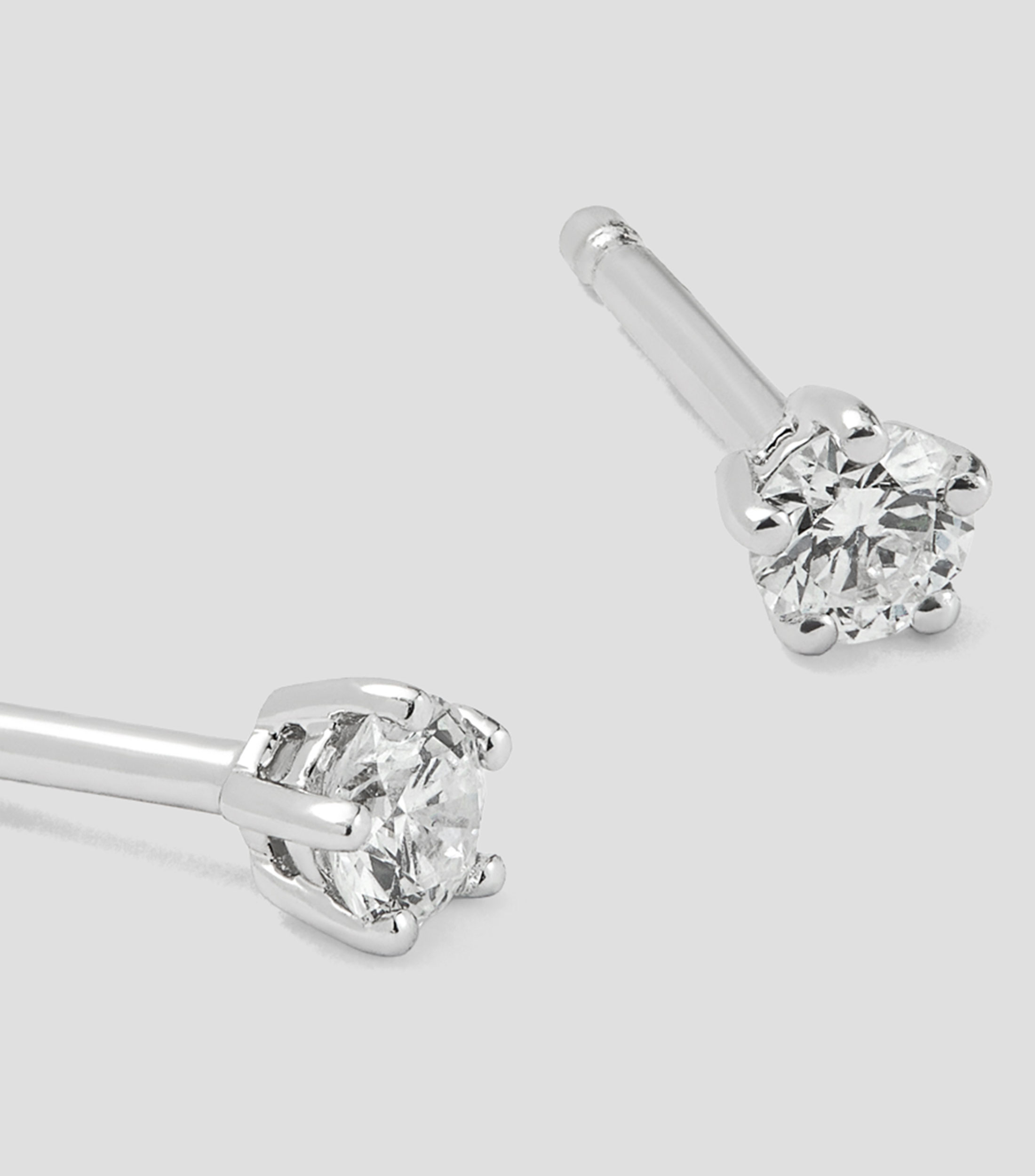 Aretes en oro blanco con diamantes Mujer