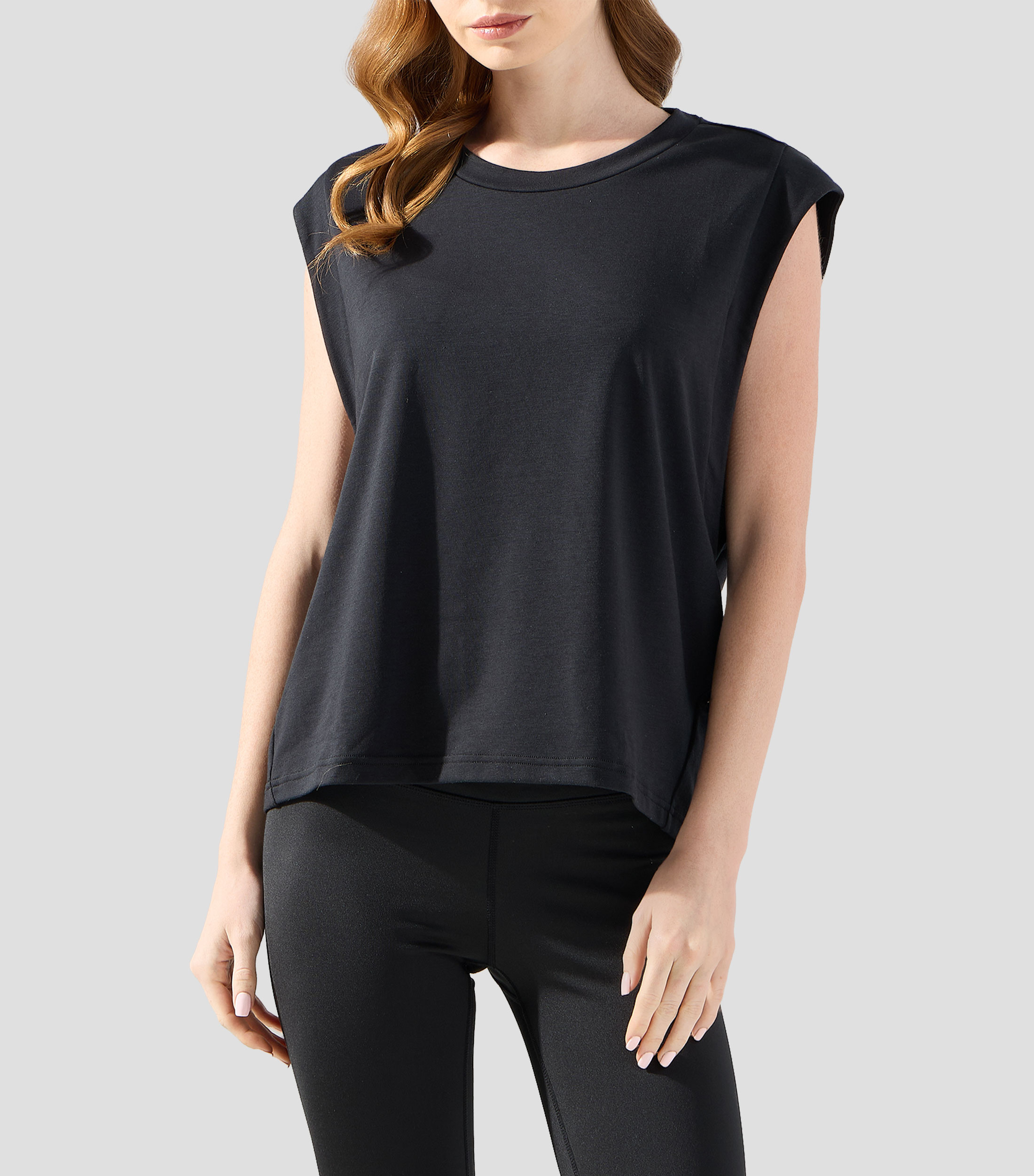 Playera de entrenamiento cuello redondo sin mangas lisa Mujer