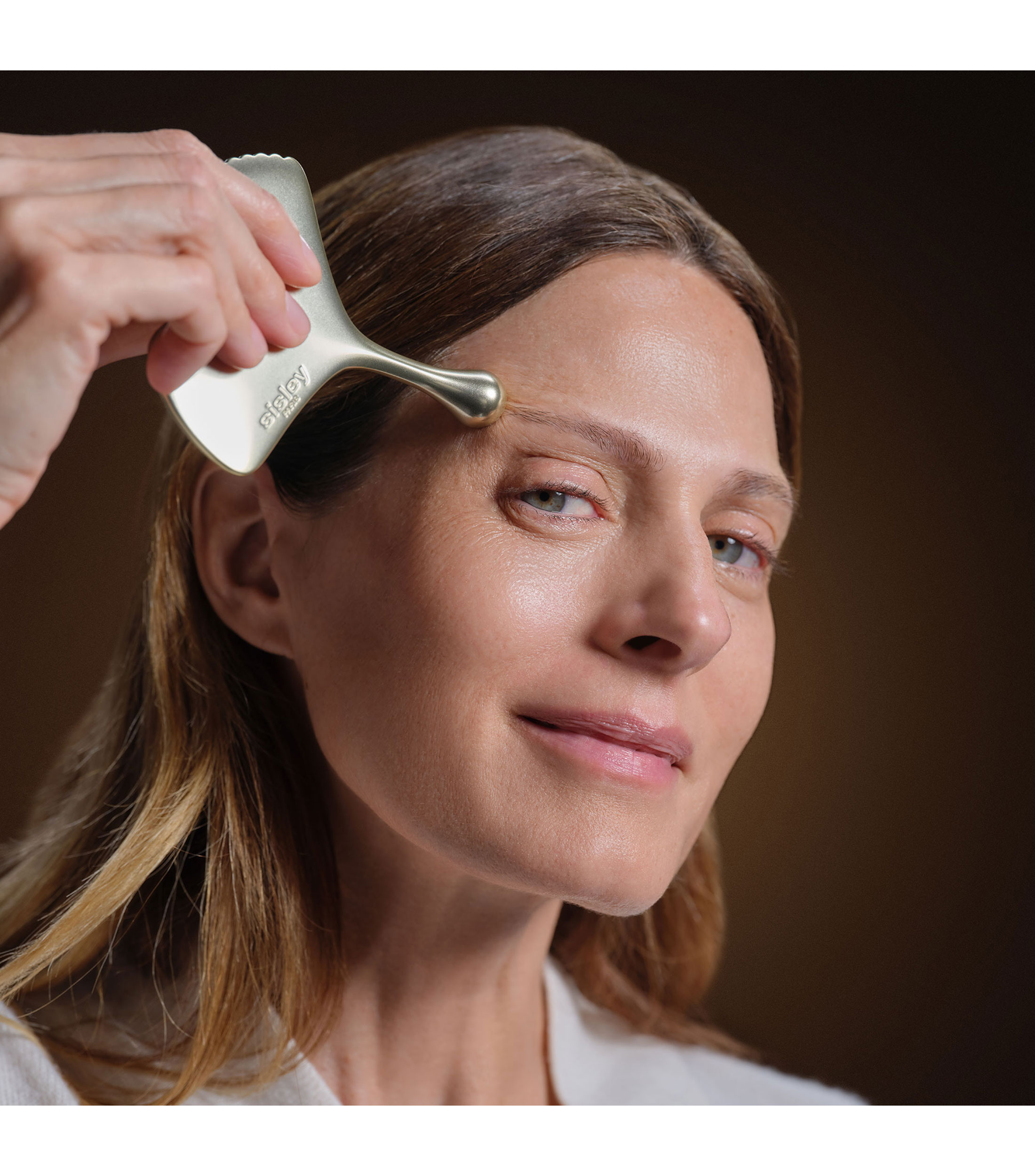 Masajeador facial antiarrugas Gingko Gua Sha