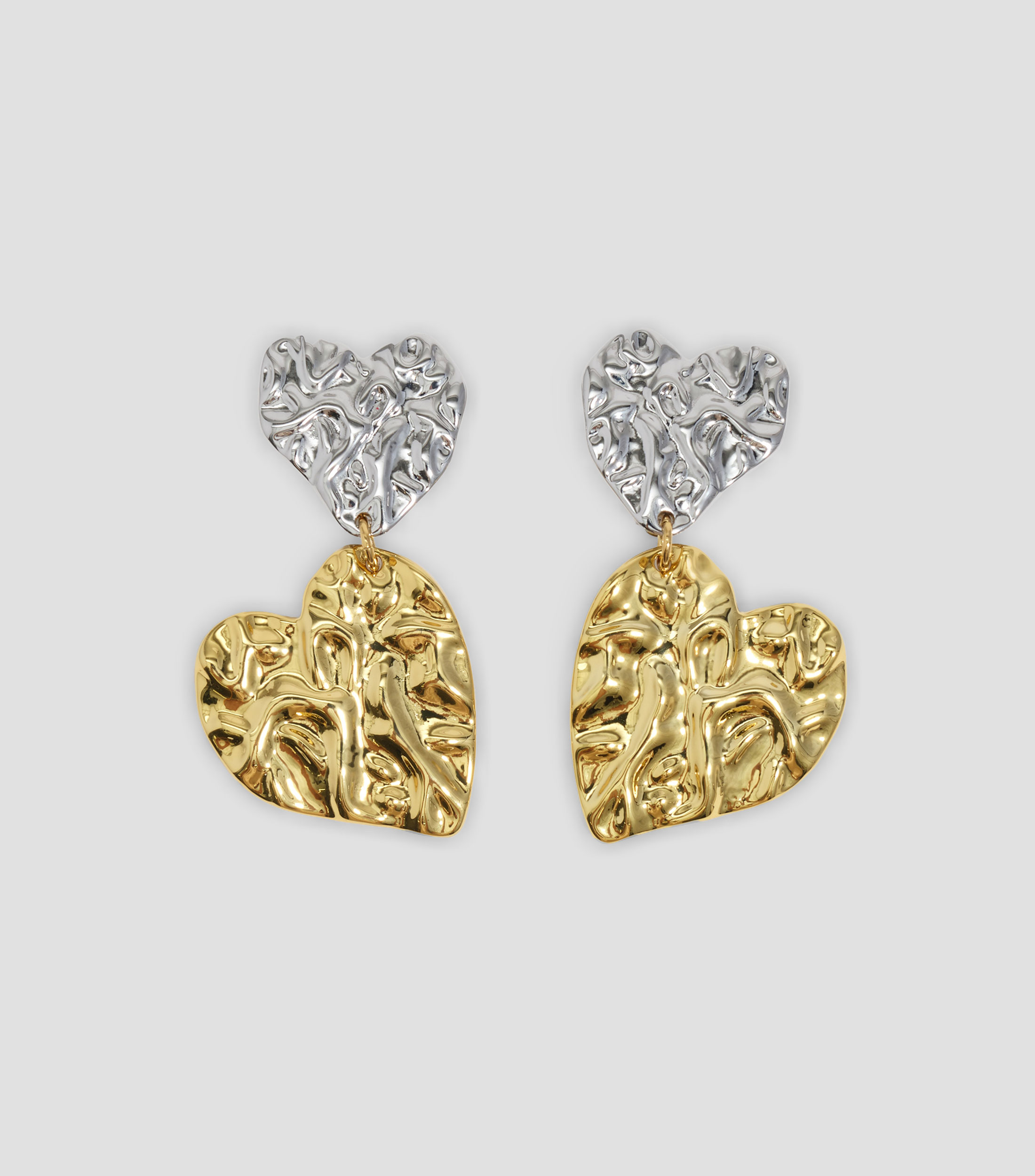Aretes corazones con texturas bicolores Mujer