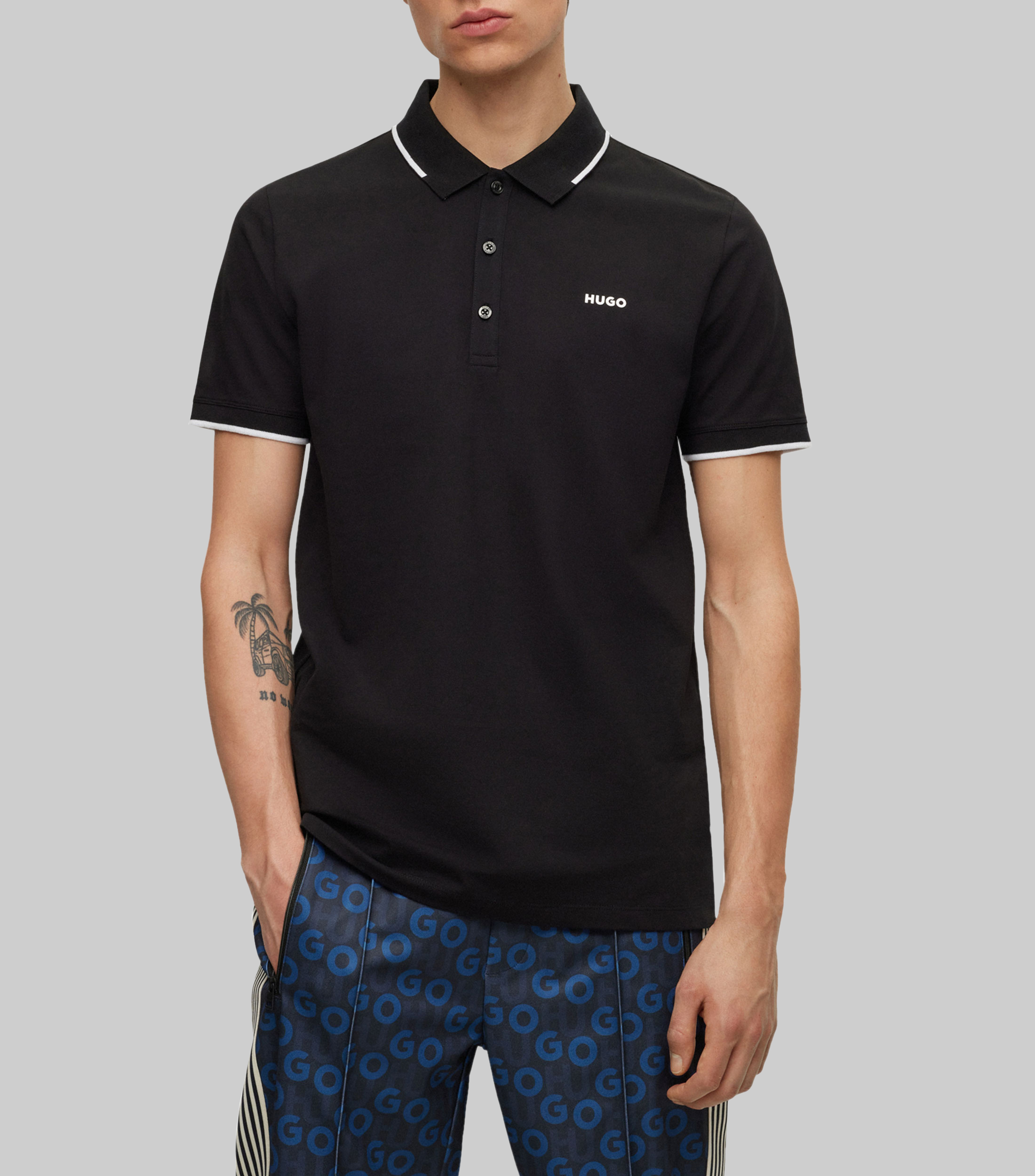 Playera tipo Polo Slim fit de algodón elástico con logo estampado Hombre