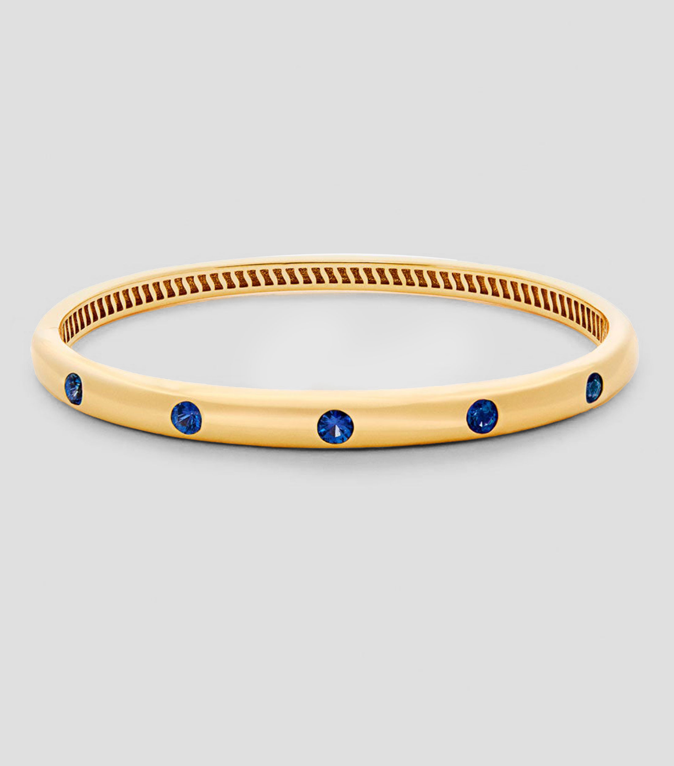 Pulsera en oro amarillo 18 Kilates con zafiros Mujer
